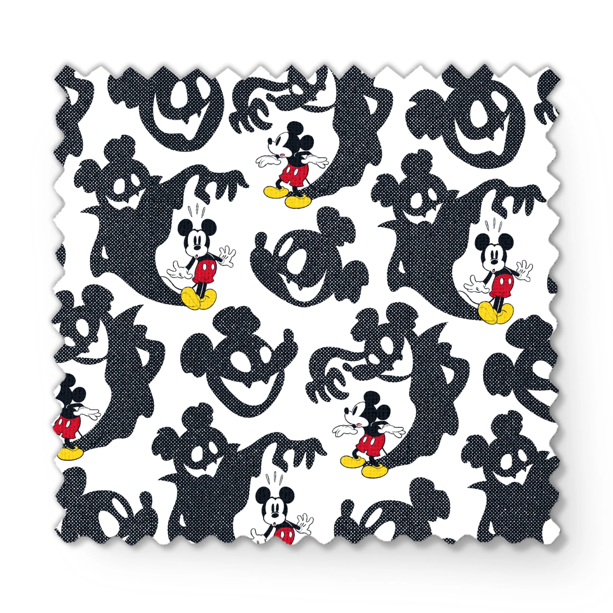 Mickey Mouse pattern with black ghost silhouettes on white background fabric swatch mockup