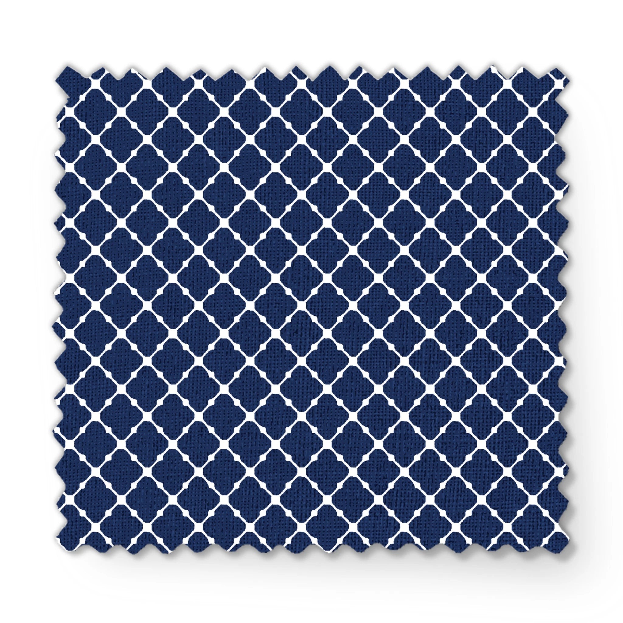 Navy blue quatrefoil pattern with white lattice design on dark background fabric swatch mockup