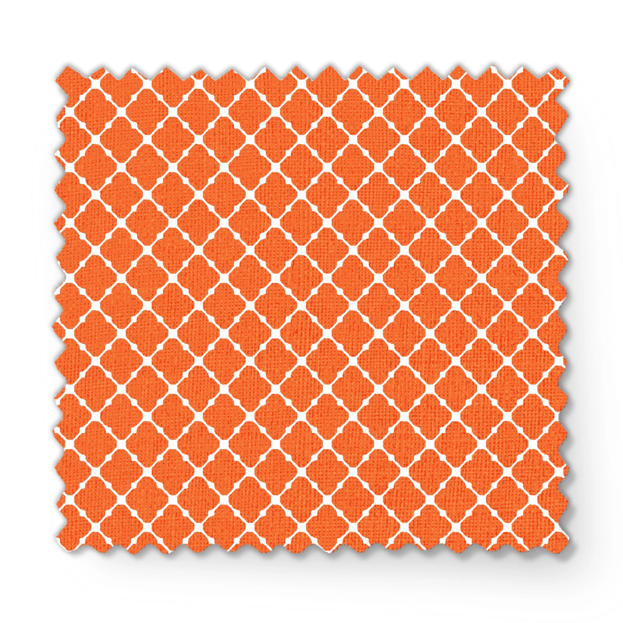 Burnt Orange and white quatrefoil pattern with smooth lattice design on orange background fabric swatch mockup