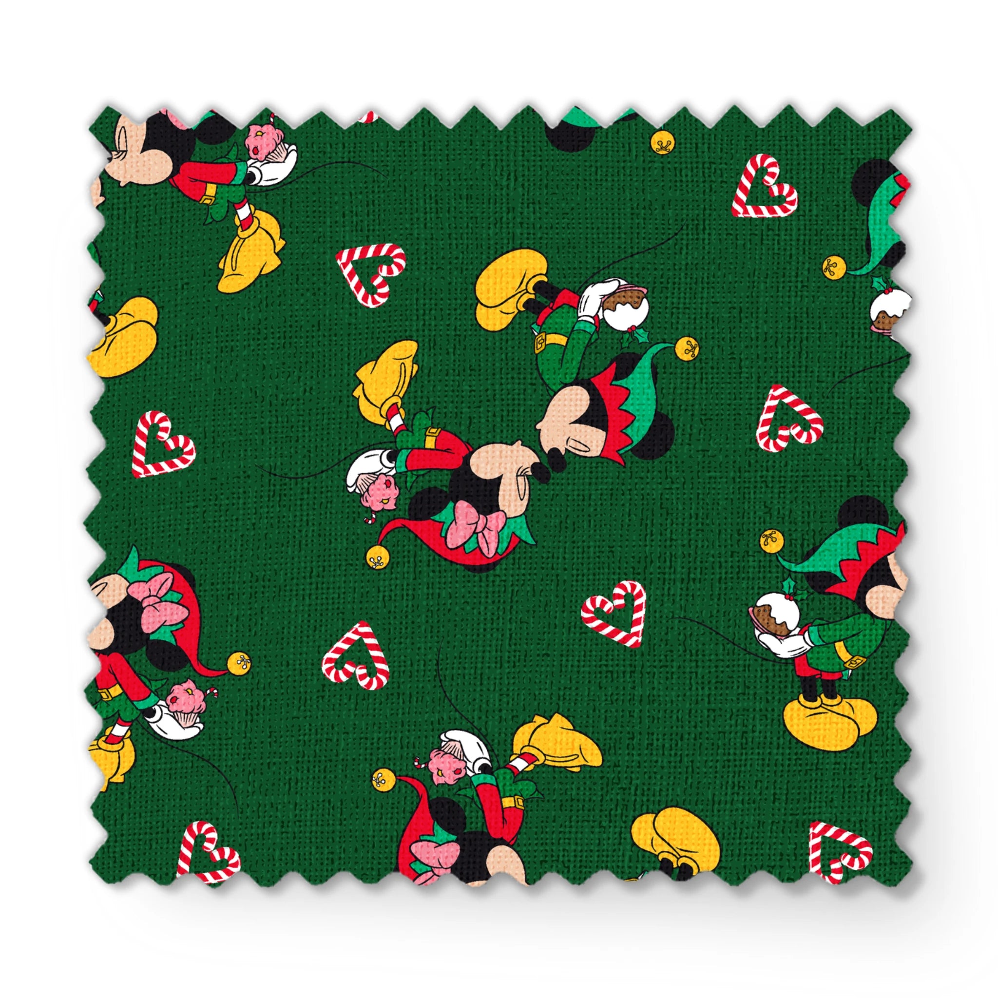 Festive Mickey Mouse pattern with candy canes on green background fabric swatch mockup