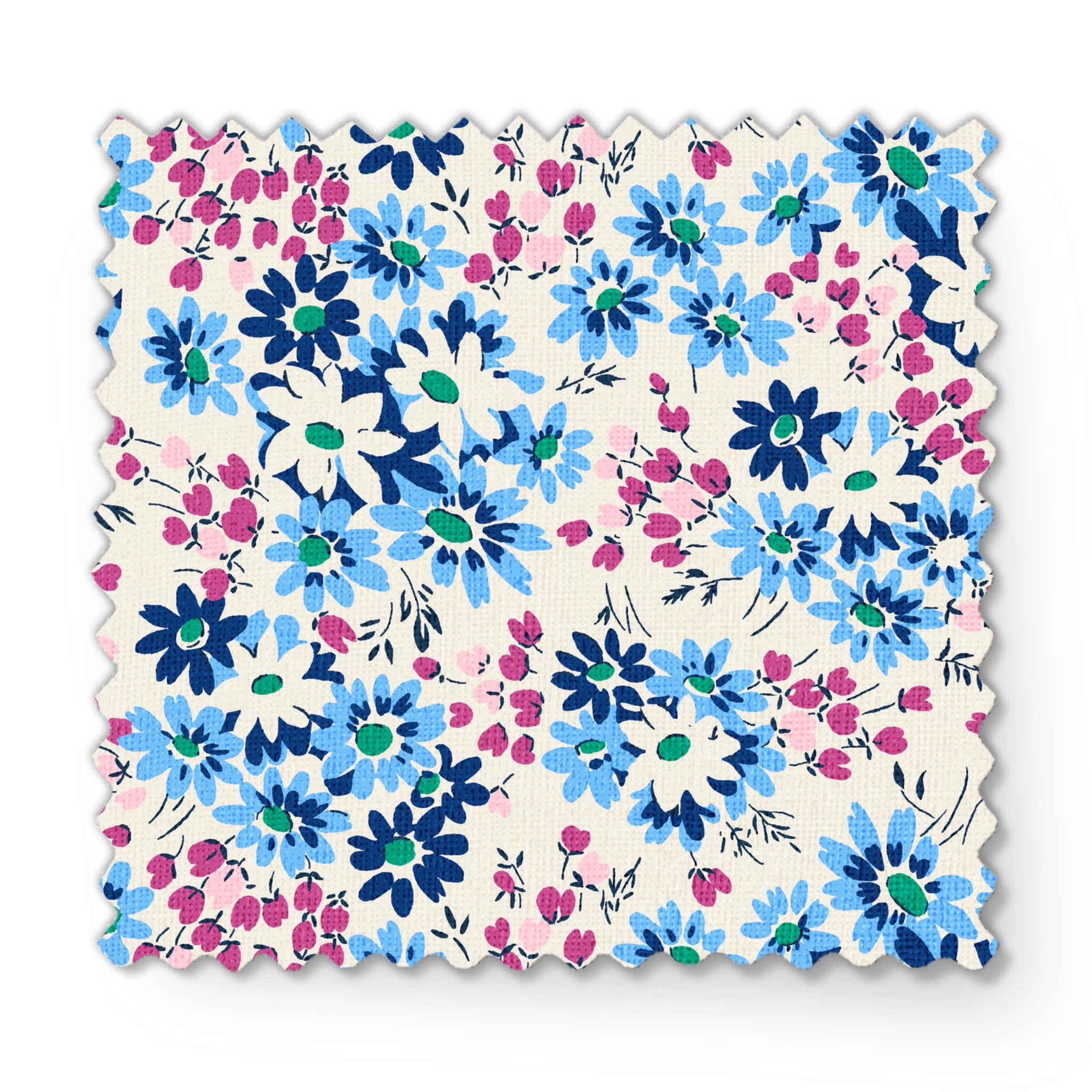 Floral pattern with blue, navy, and white daisies alongside small magenta berries on cream background fabric swatch mockup