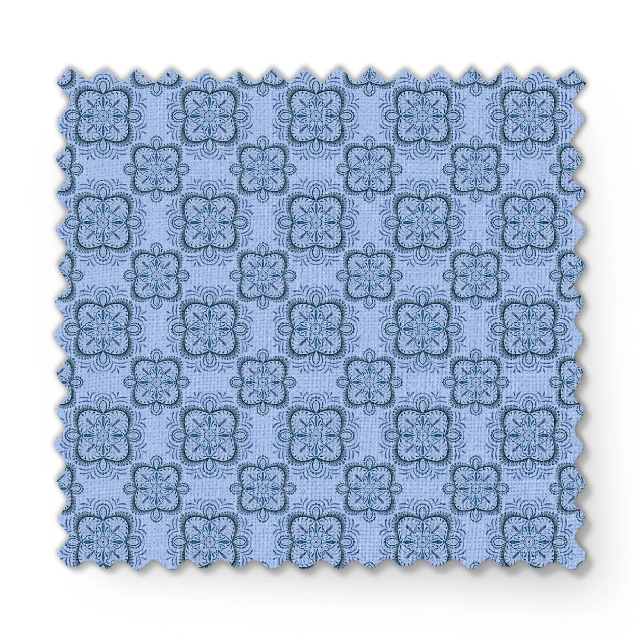Symmetrical floral mandala pattern in layered blue tones with hand-drawn botanical details, designed by Nicole Tamarin. fabric swatch mockup