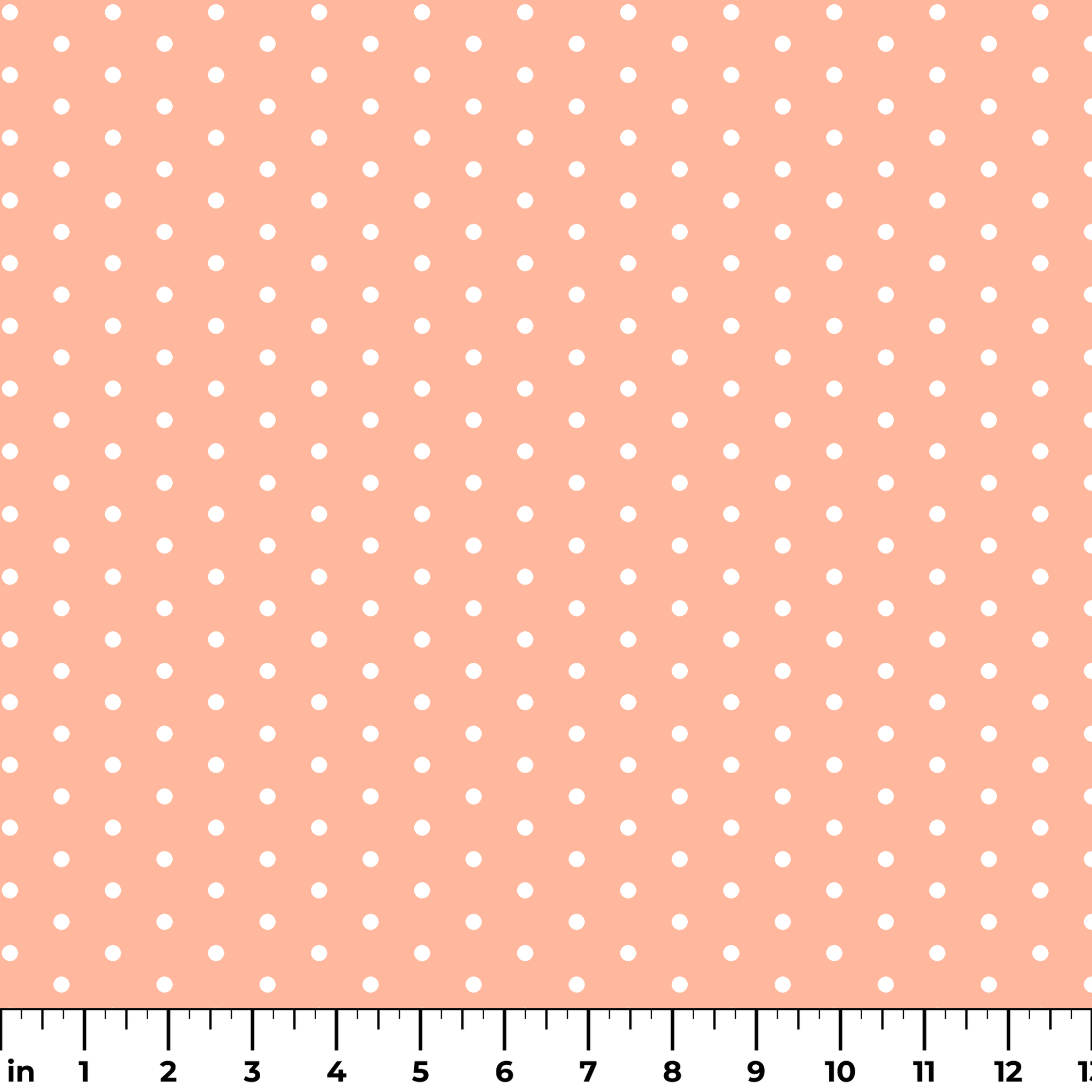 White circles on a peach/salmon colored background ruler