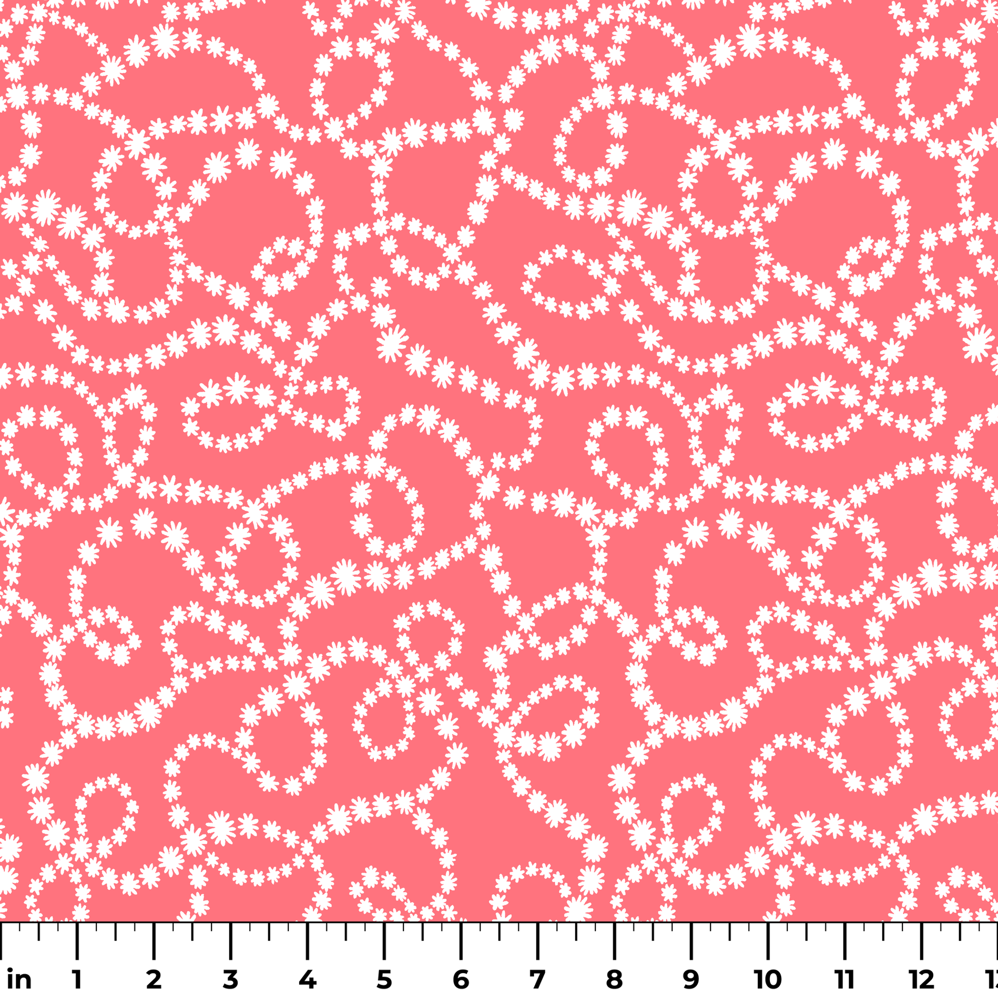 White dot patterns forming swirling chains on coral pink background ruler
