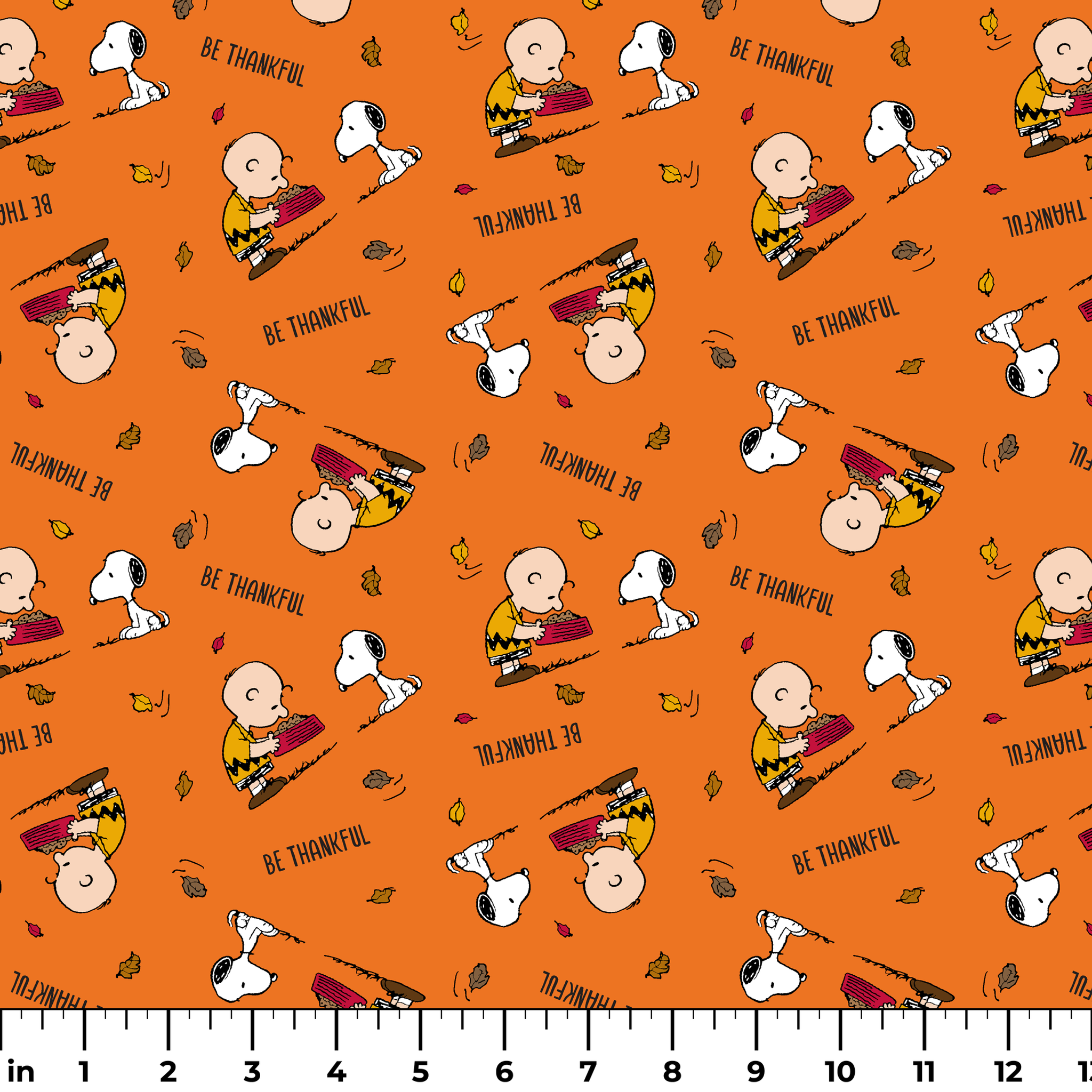Peanuts characters on orange background with autumn leaves and "Be Thankful" text pattern ruler