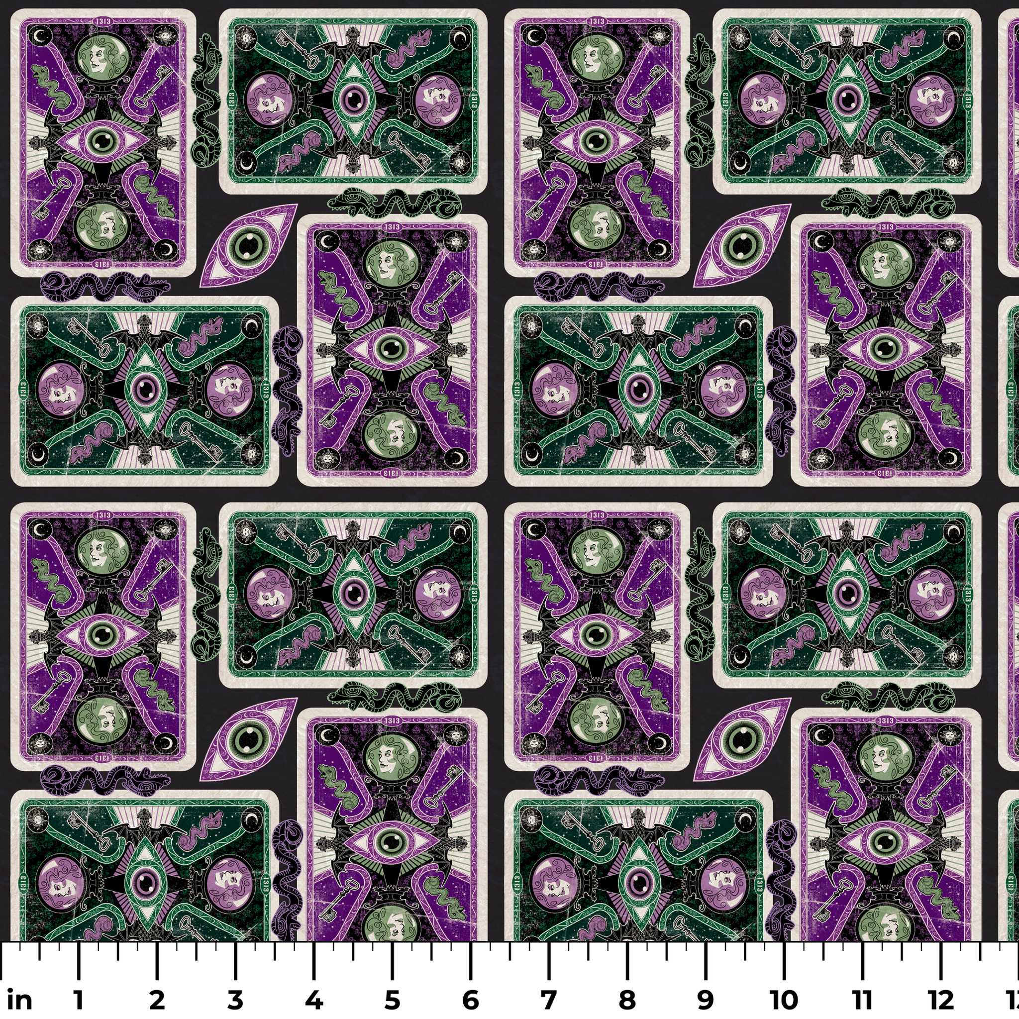 Ornate playing card designs with purple and green patterns featuring central eye motifs and circular number elements against a black background. ruler