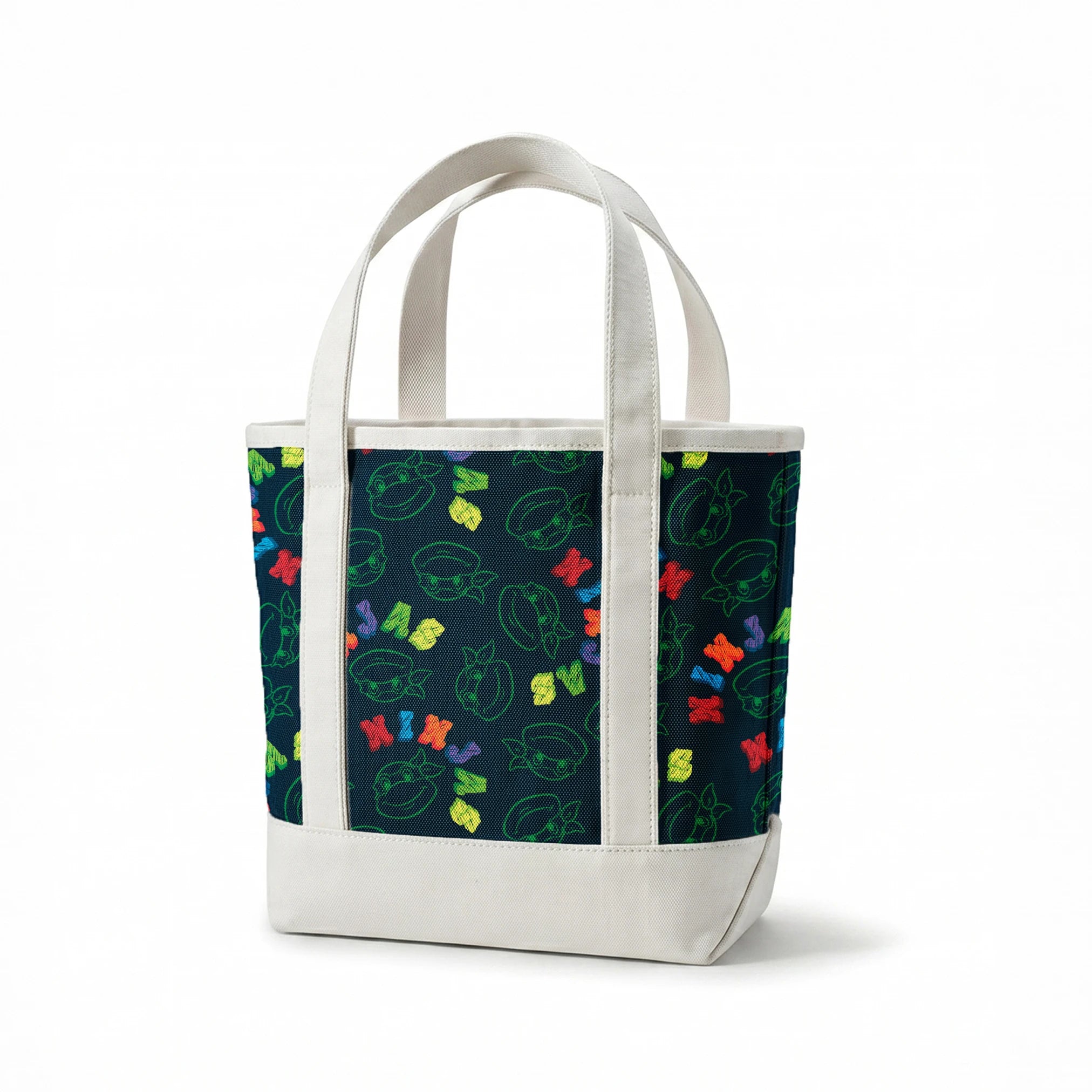 Colorful Ninja Turtles pattern with green outlines on dark blue background springs canvastote mockup