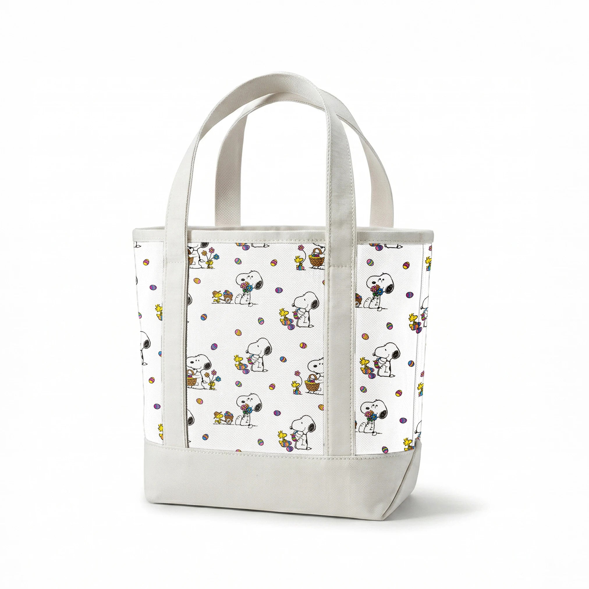 Cartoon pattern with Snoopy and Woodstock celebrating Easter with colorful eggs and baskets on white background springs canvastote mockup