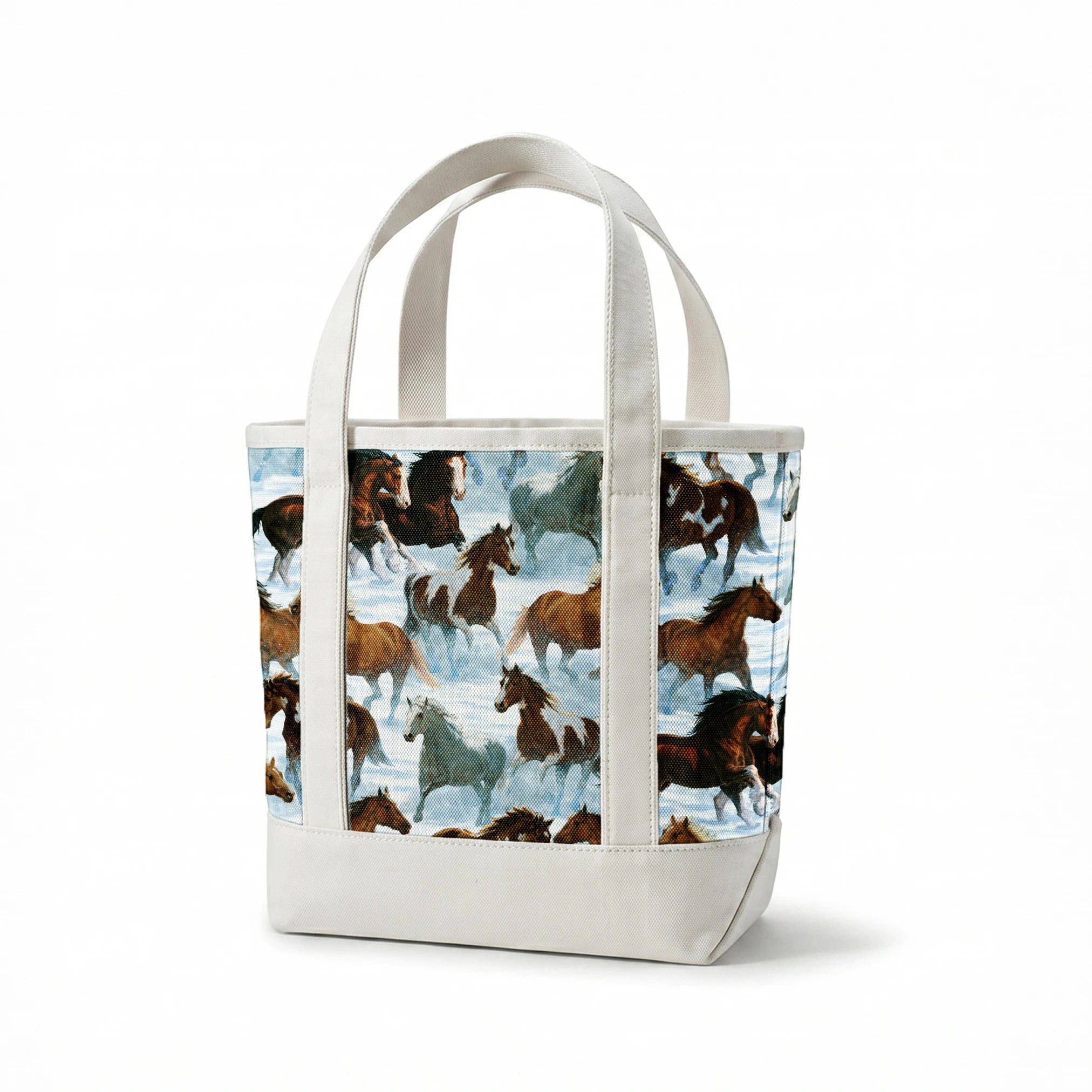 Wild horses running through snowy landscape in various brown, black and gray colors springs canvastote mockup