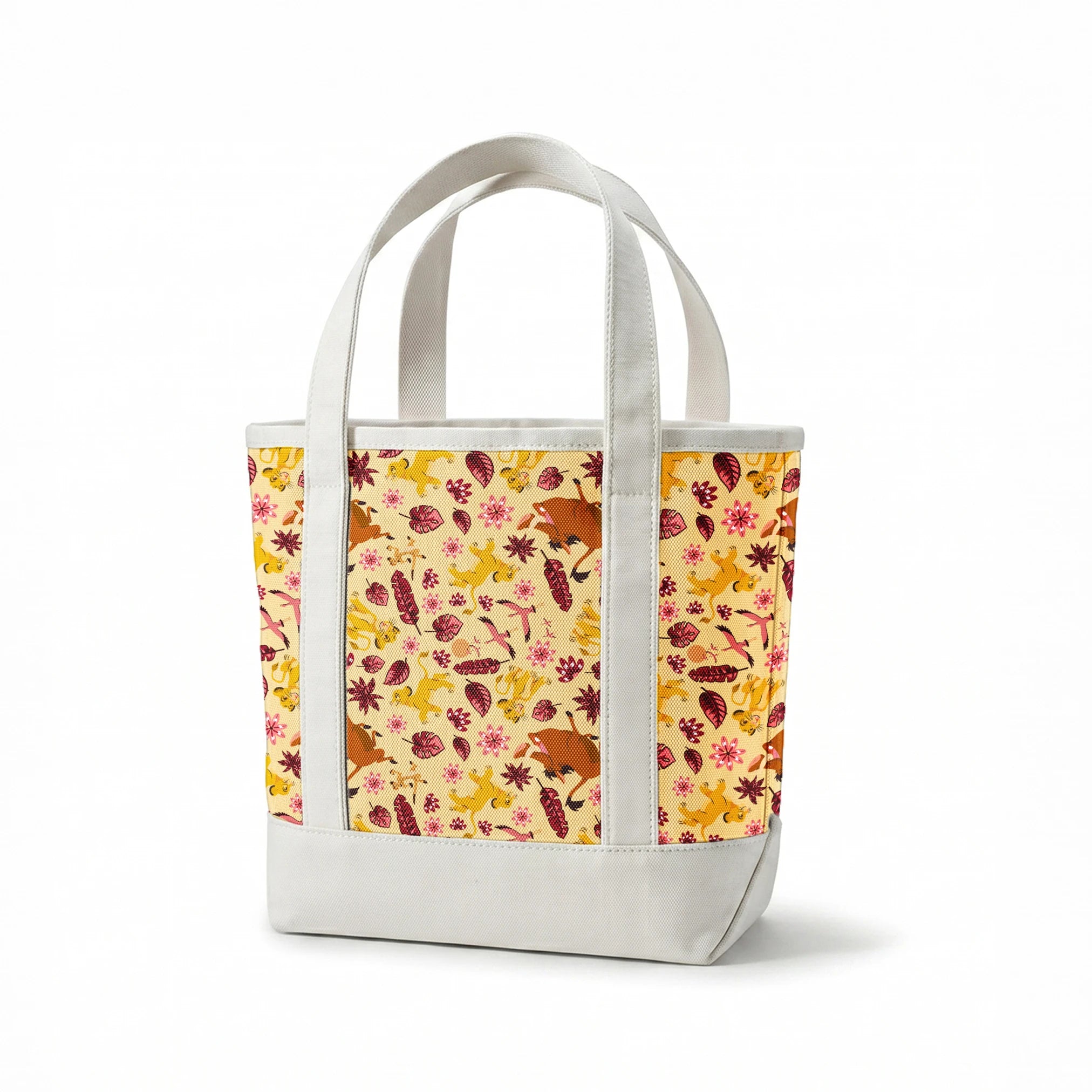 Decorative pattern with lions, gazelles, and boars in yellows and browns among maroon leaves and pink flowers springs canvastote mockup