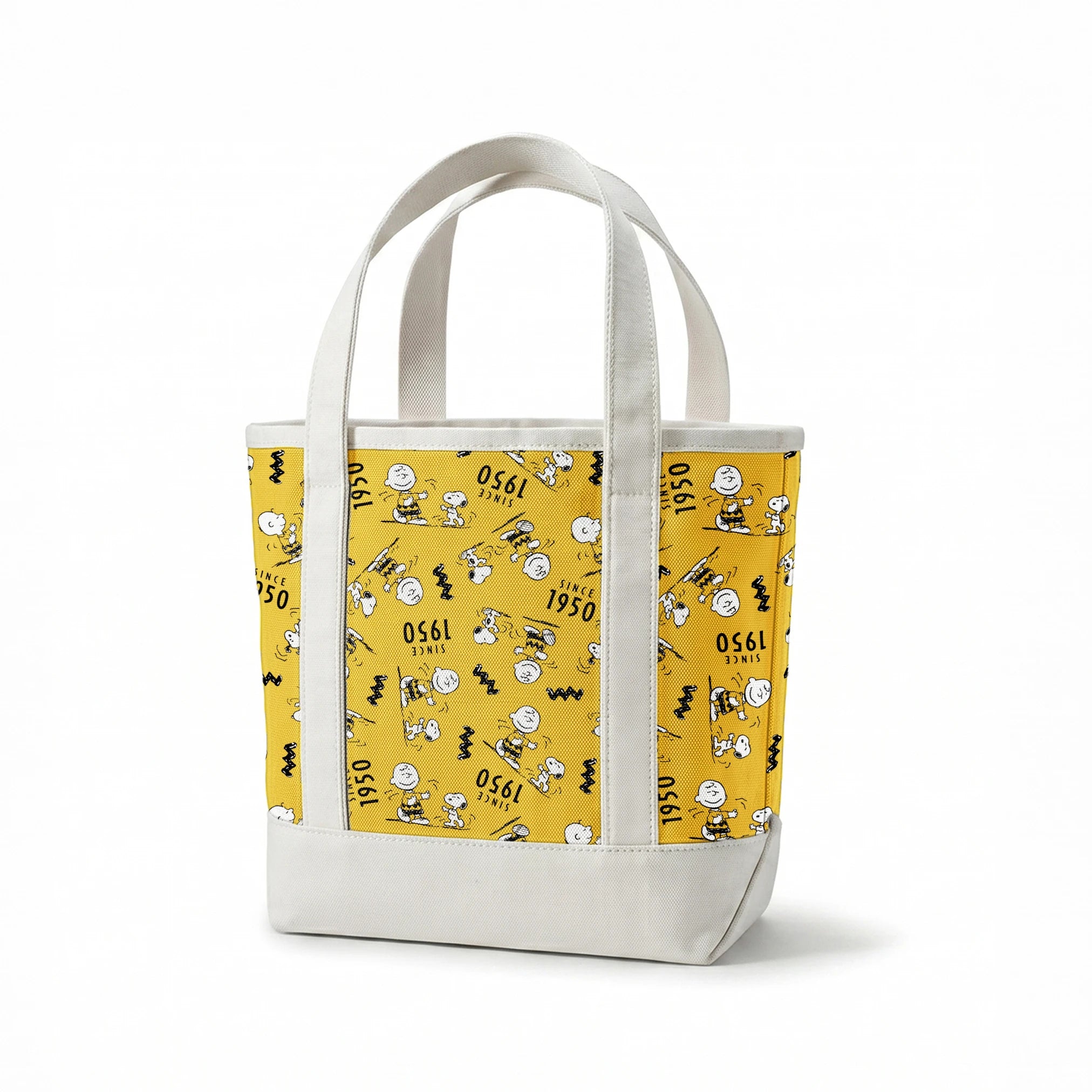 Peanuts cartoon pattern on yellow background with Snoopy and Charlie Brown, "Since 1950" text springs canvastote mockup