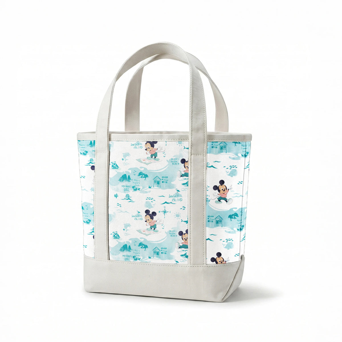 Cartoon Mickey Mouse pattern with turquoise ocean elements, sharks, waves, and "Safari" text springs canvastote mockup