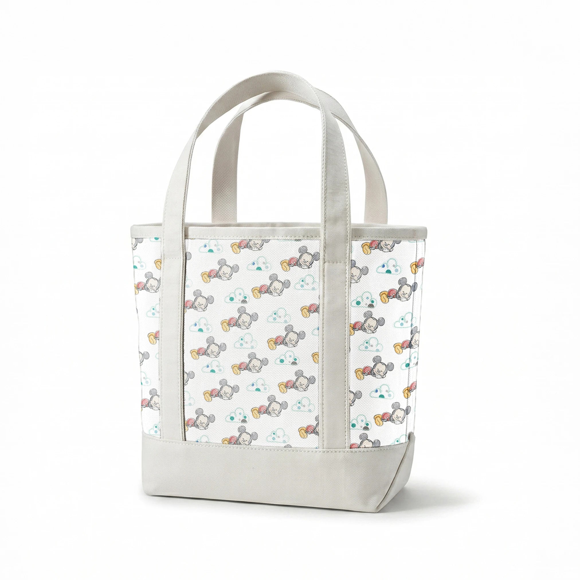 Cute cartoon mouse characters sleeping peacefully on white background with mint green clouds pattern springs canvastote mockup