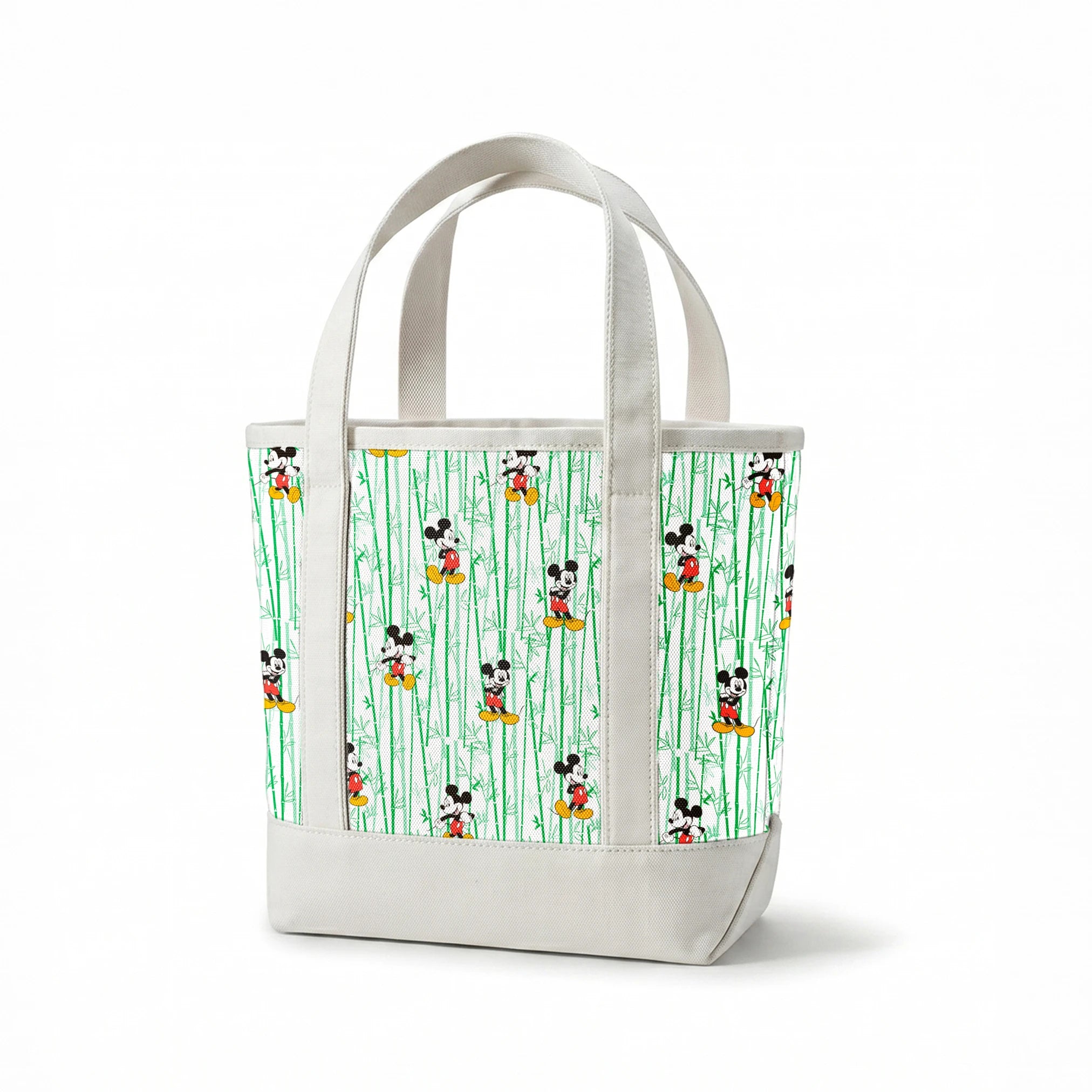Cartoon mouse character pattern on white background with green vertical stripes springs canvastote mockup