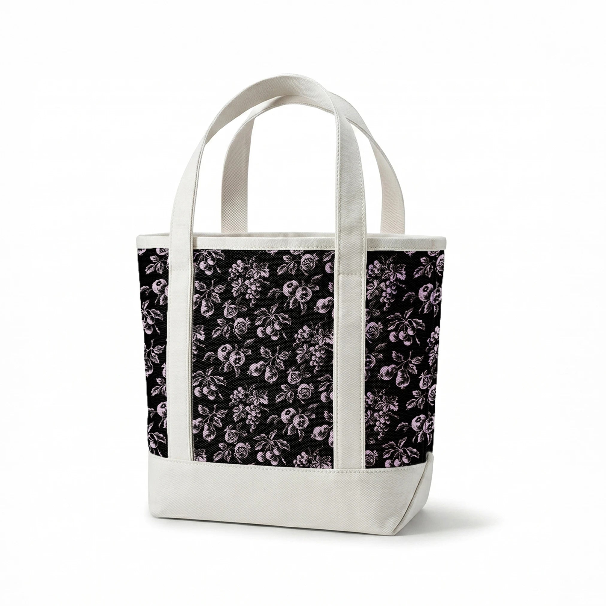 Elegant monochrome floral pattern with delicate white flowers scattered on a black background springs canvastote mockup