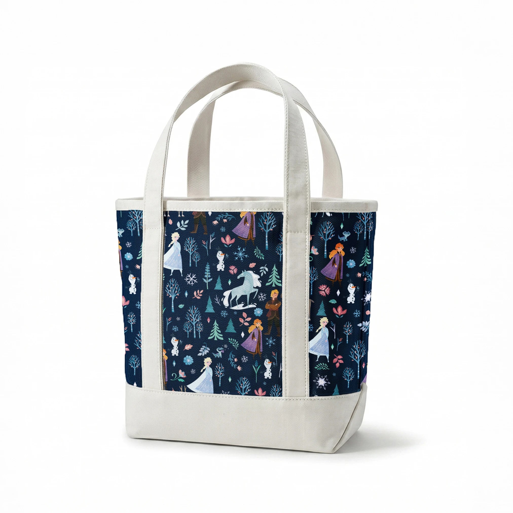 Illustrated Frozen pattern with Elsa, Anna, & friends, and floral elements on dark blue background springs canvastote mockup
