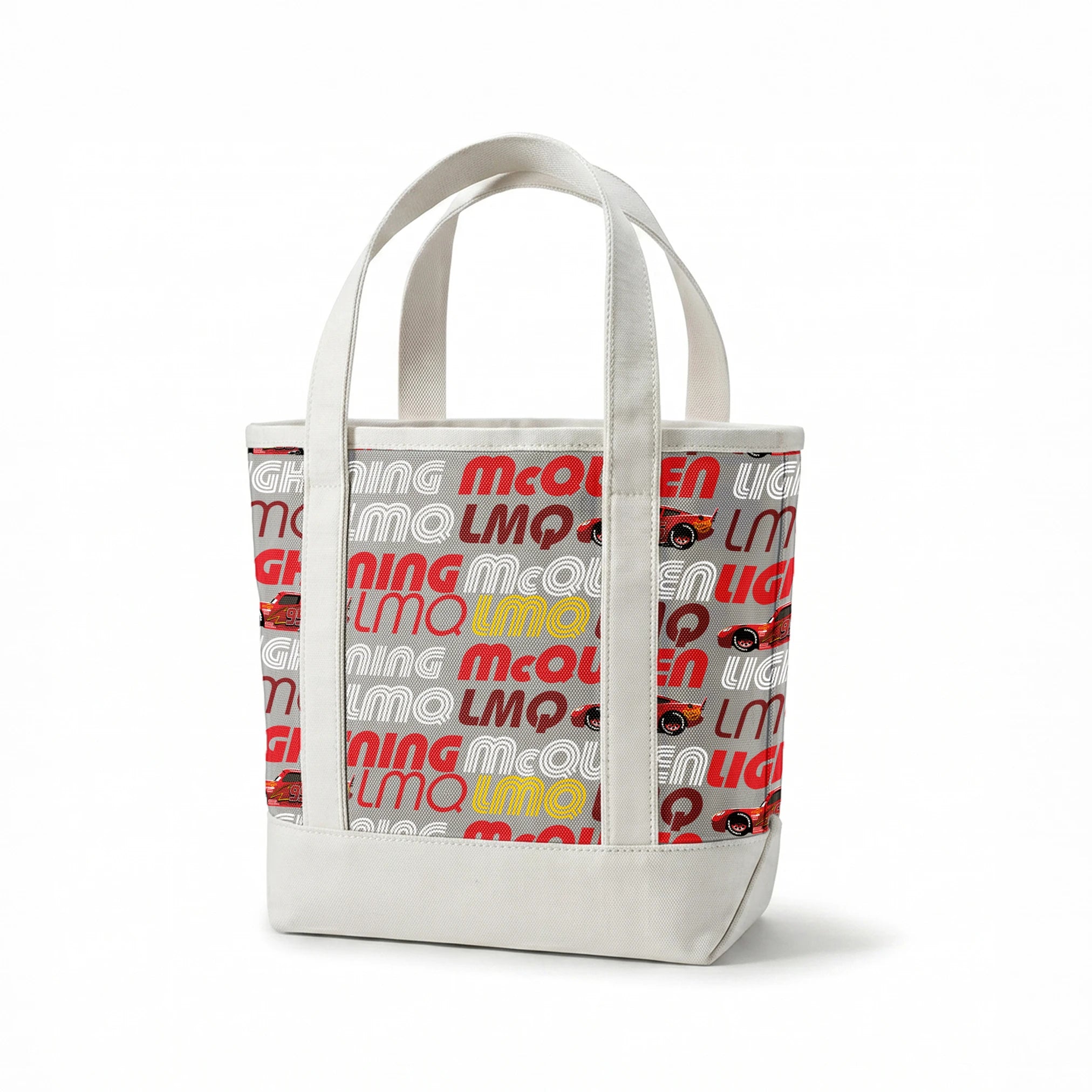 Lightning McQueen race car graphic with repeating LMQ text in red, yellow, and white on gray background springs canvastote mockup