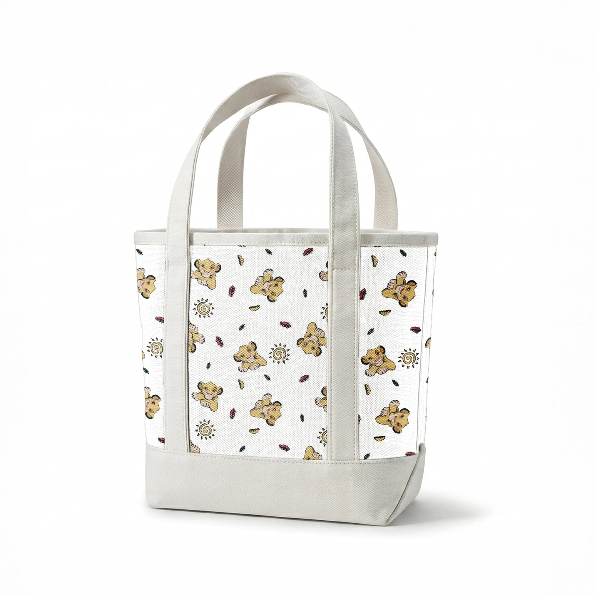 Cute cartoon lion cubs pattern with suns and leaves on white background springs canvastote mockup