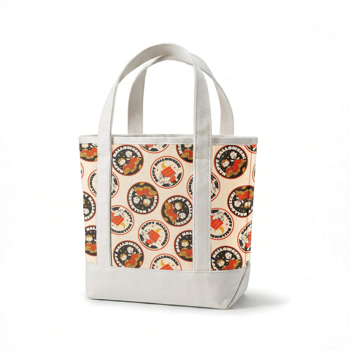 Peanuts Halloween pattern with circular badges featuring characters and "Happy Halloween" text on beige background springs canvastote mockup