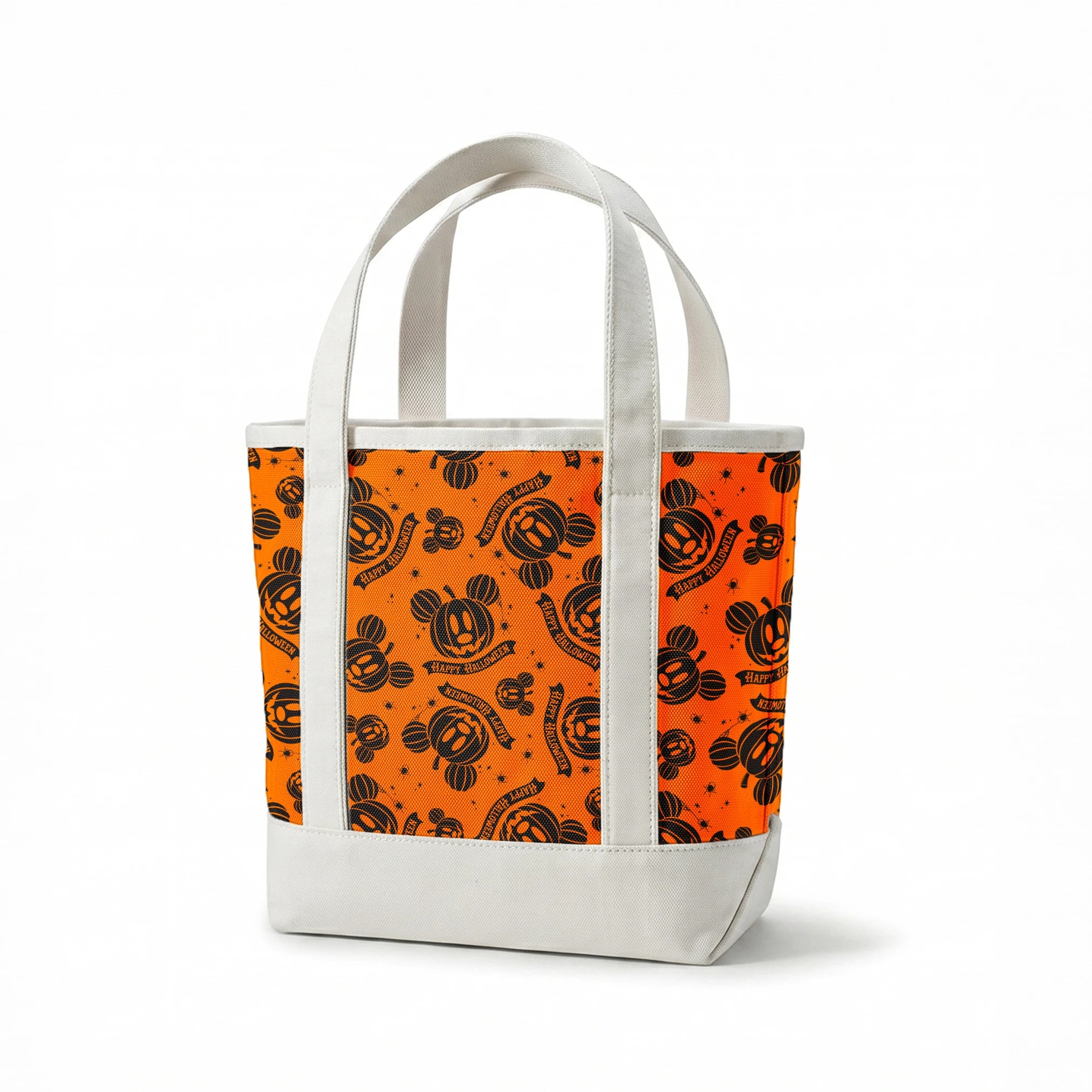 Halloween pattern with Disney-inspired jack-o'-lantern pumpkins and "Happy Halloween" text on bright orange background springs canvastote mockup