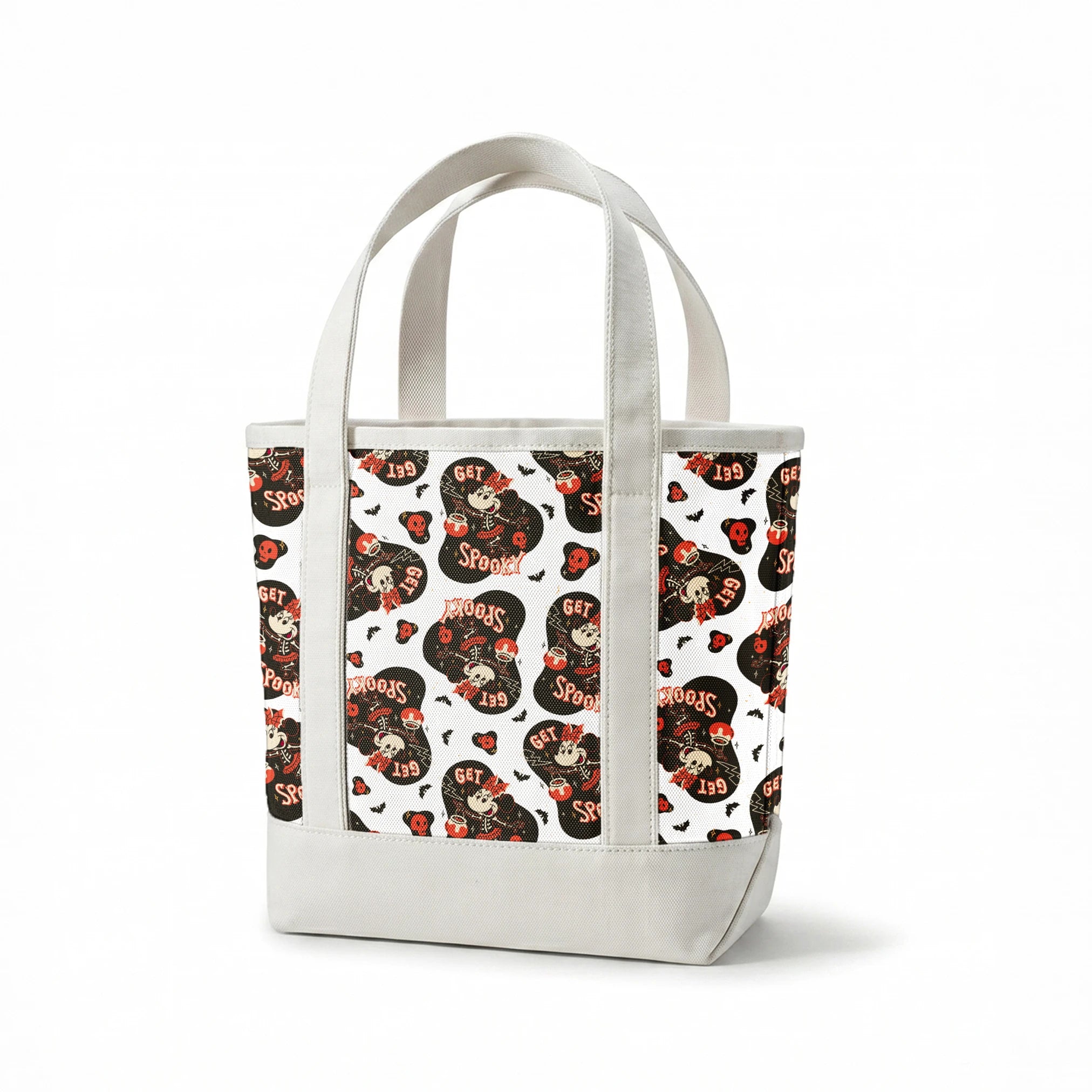 Halloween pattern with Minnie Mouse shapes, "Get Spooky" text, skulls, bats, and hearts on white background springs canvastote mockup