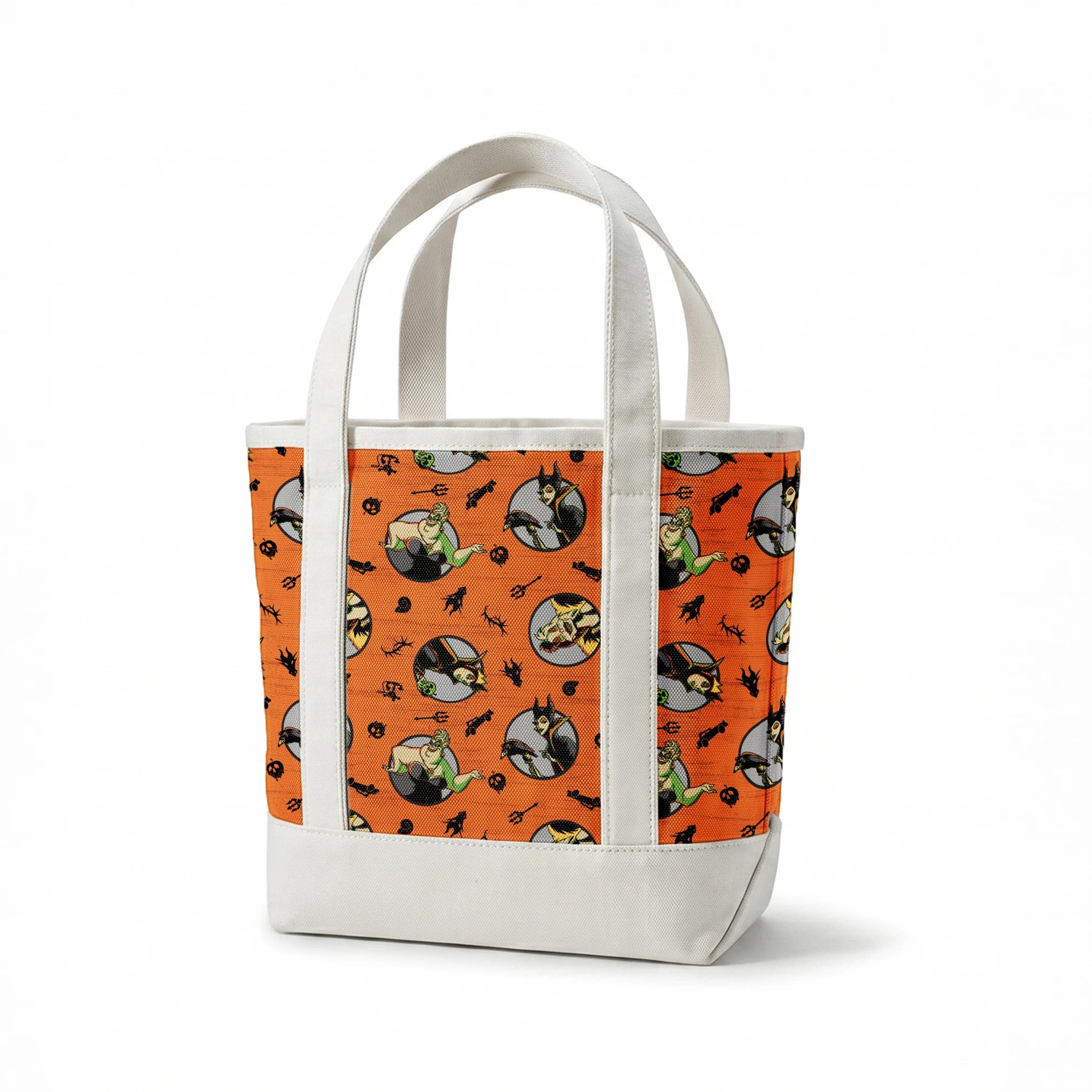 Halloween-themed orange pattern with circular Disney Villain portraits, black cats, bats, pumpkins, and spooky symbols springs canvastote mockup