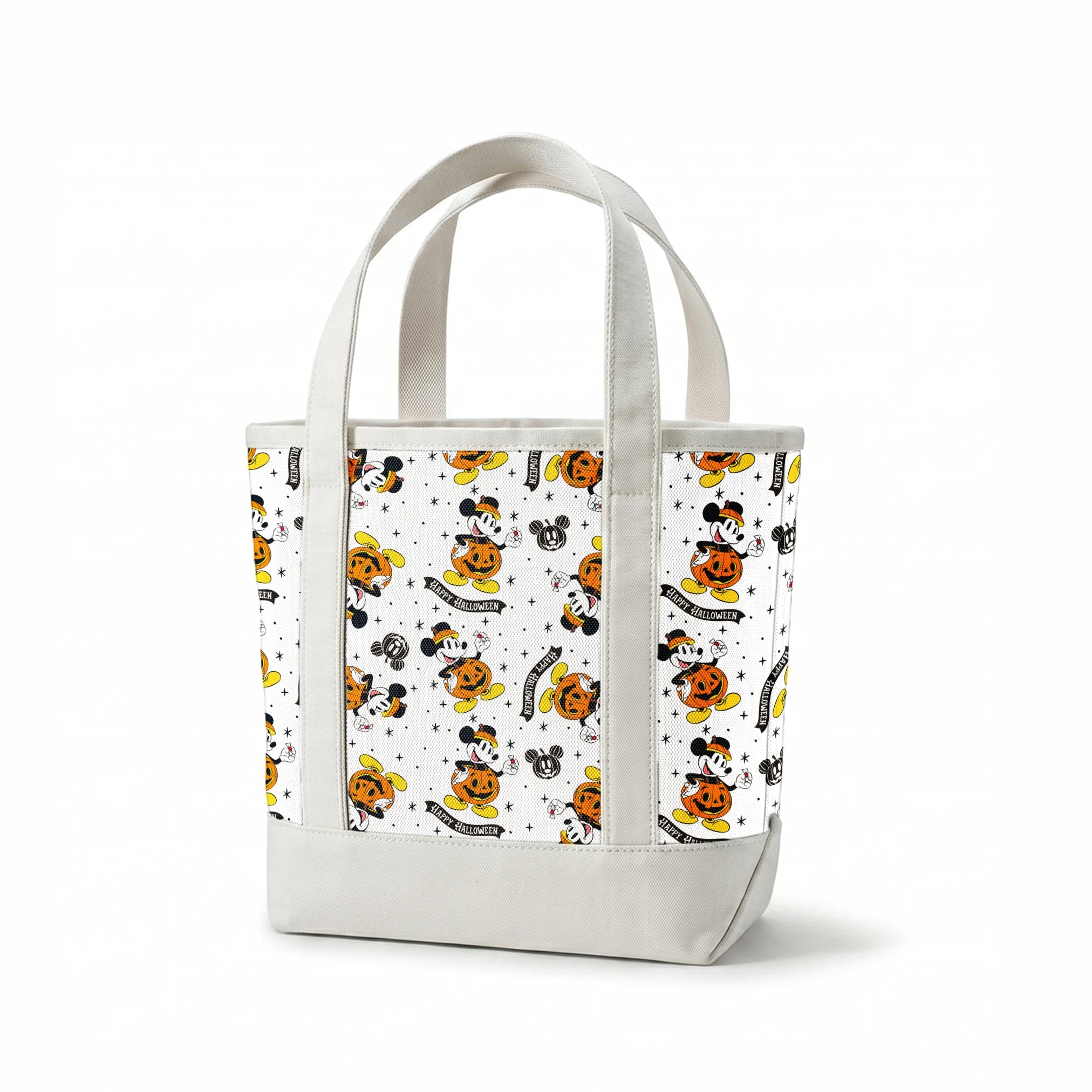 Mickey Mouse Halloween pattern dressed as pumpkins on white background with stars and "Happy Halloween" text springs canvastote mockup