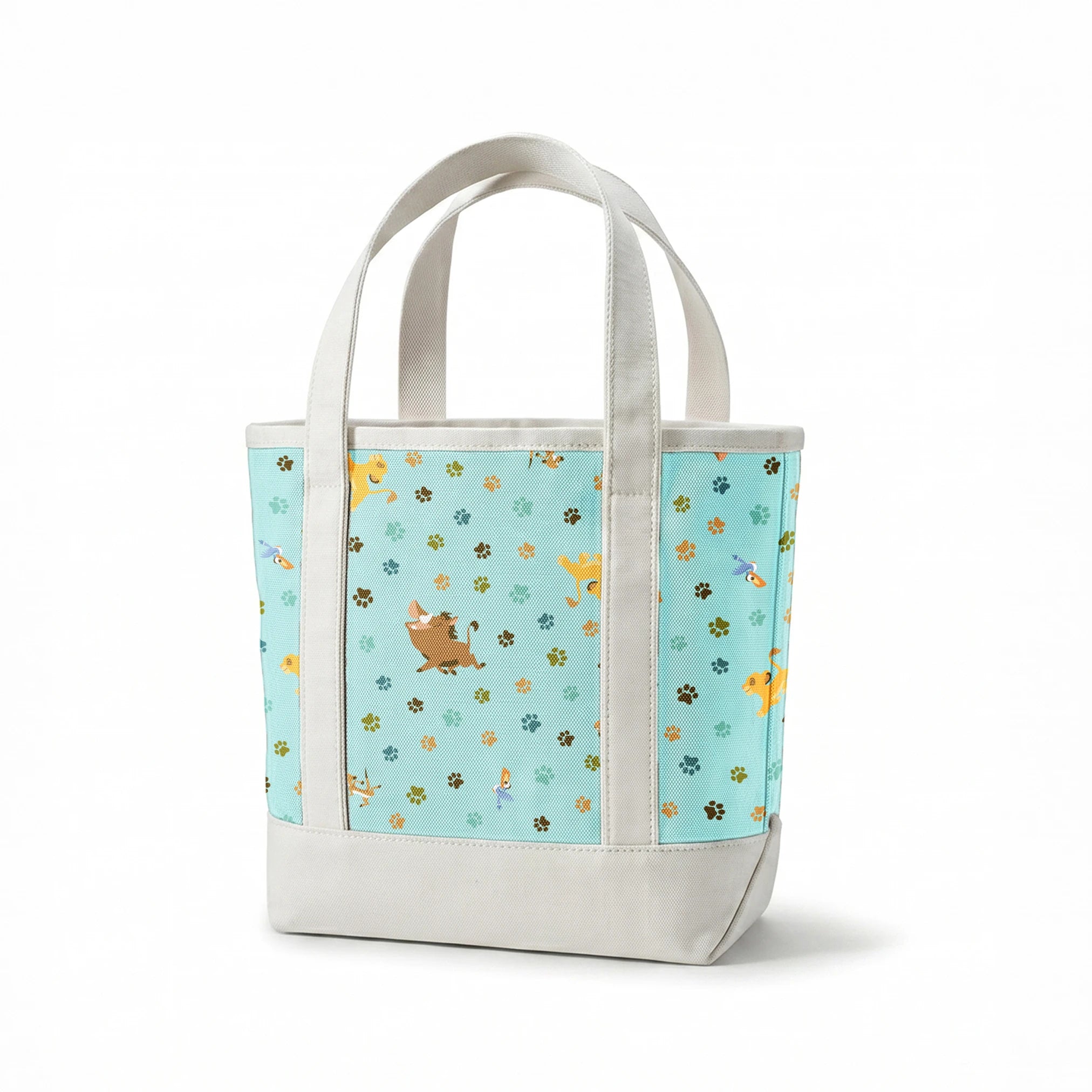 The Lion King pattern with paw prints on light blue background springs canvastote mockup
