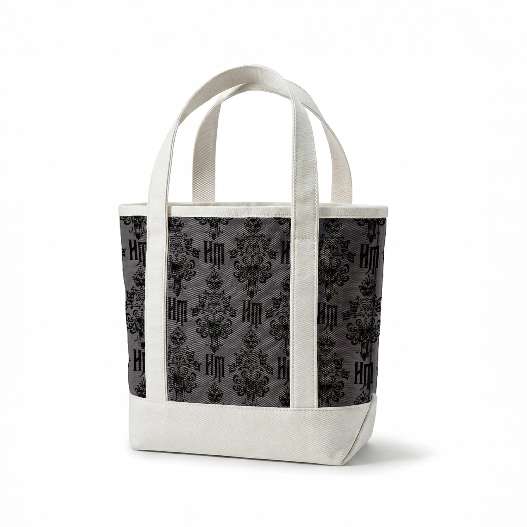 Dark gray background with black ornate damask pattern featuring decorative flourishes and monogram elements springs canvastote mockup