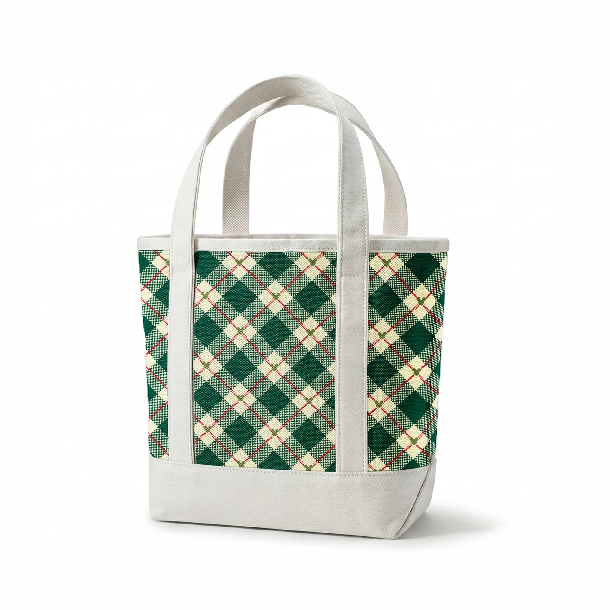 Diagonal green and cream plaid pattern with small Mickey Mouse silhouettes at intersections of red stripes springs canvastote mockup