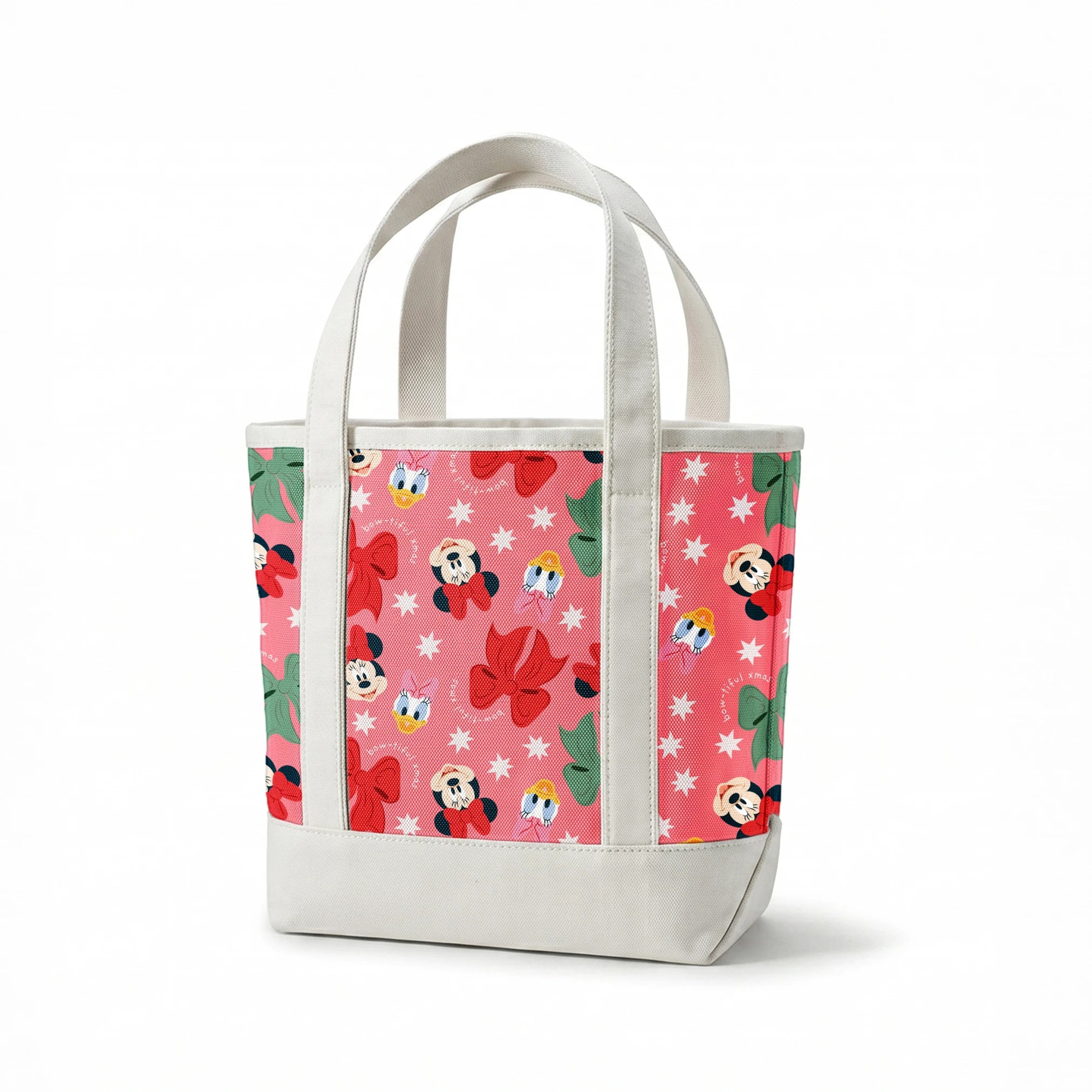Disney character pattern with Mickey and Minnie Mouse, Donald Duck, bows in red and green on pink background with white stars springs canvastote mockup