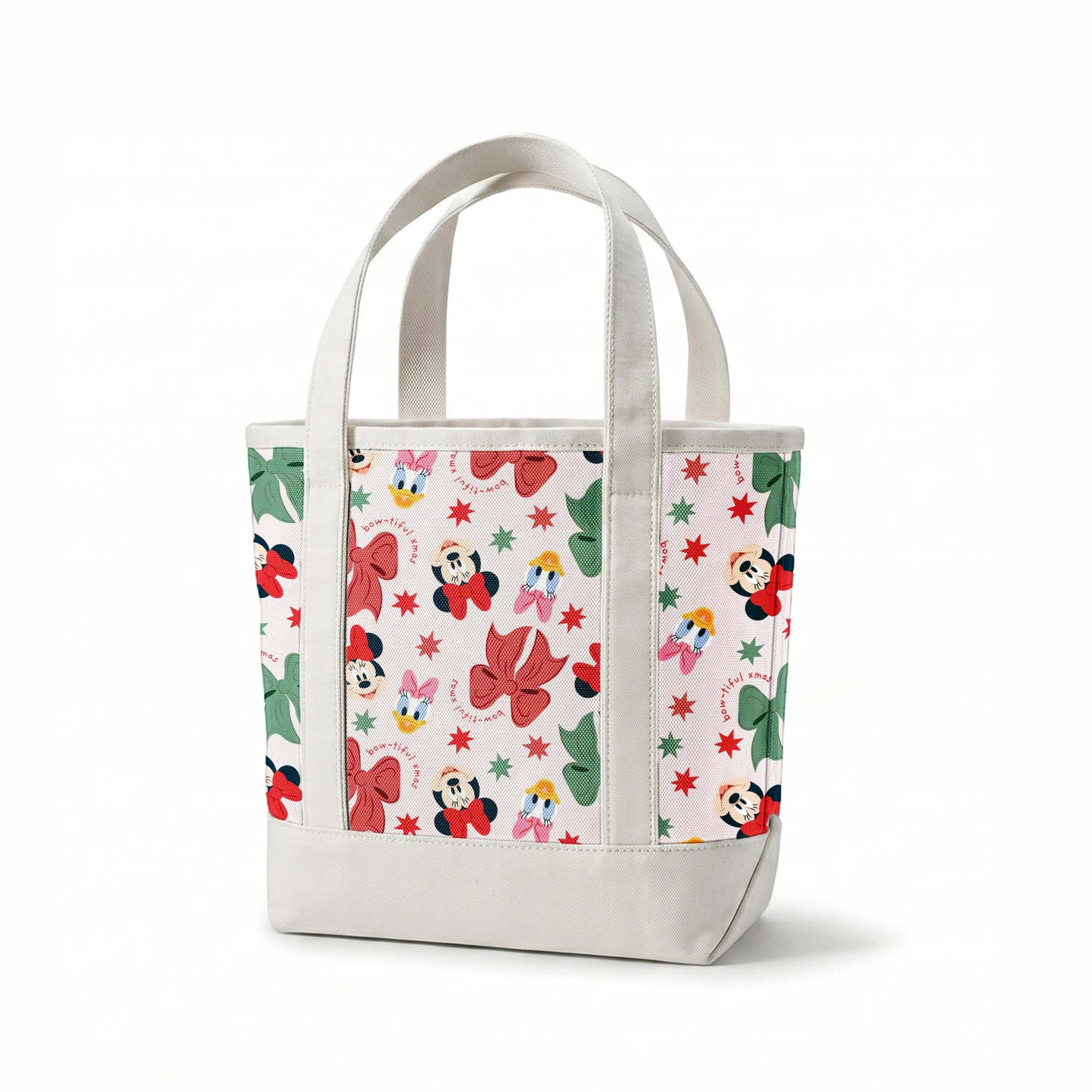 Disney pattern with Minnie Mouse and Daisy Duck characters, green and red bows, and green stars on light background. springs canvastote mockup