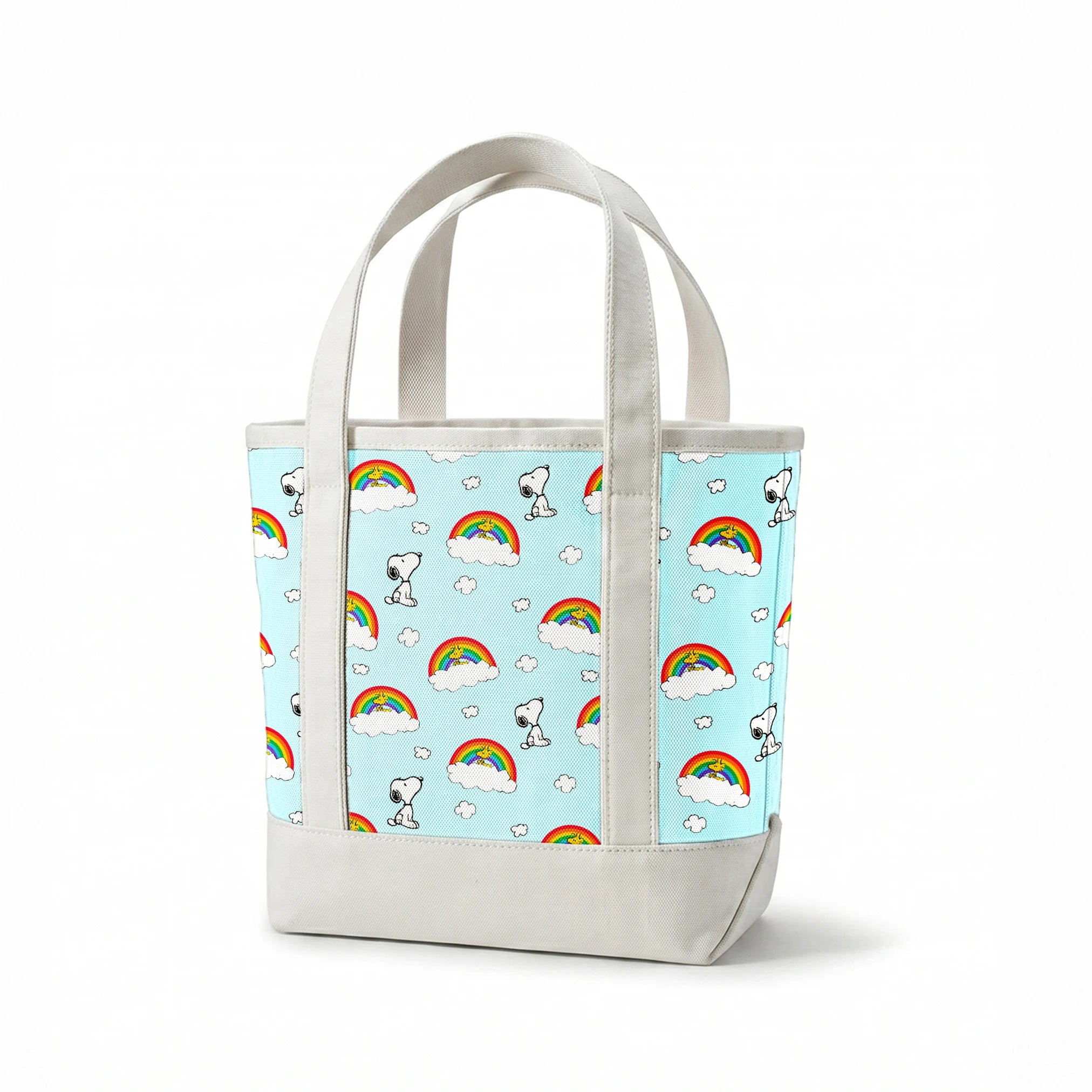 Snoopy and Woodstock characters on light blue background with rainbows, clouds and white fluffy clouds springs canvastote mockup