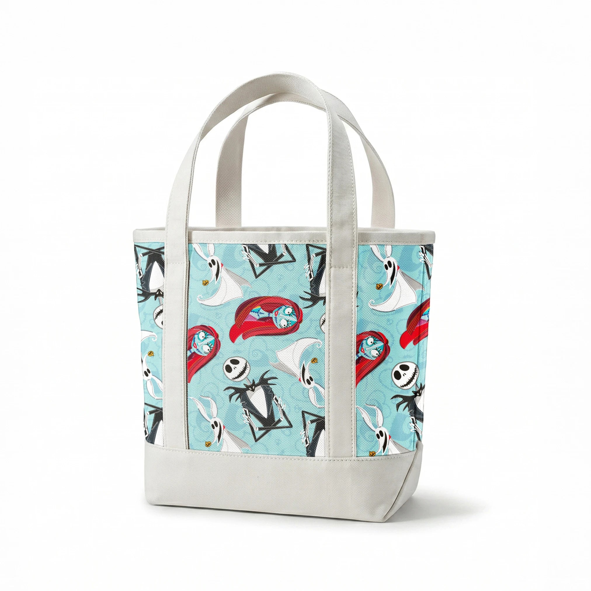 Nightmare Before Christmas pattern with Jack Skellington, Zero ghost dog, and coffin shapes on light blue background springs canvastote mockup