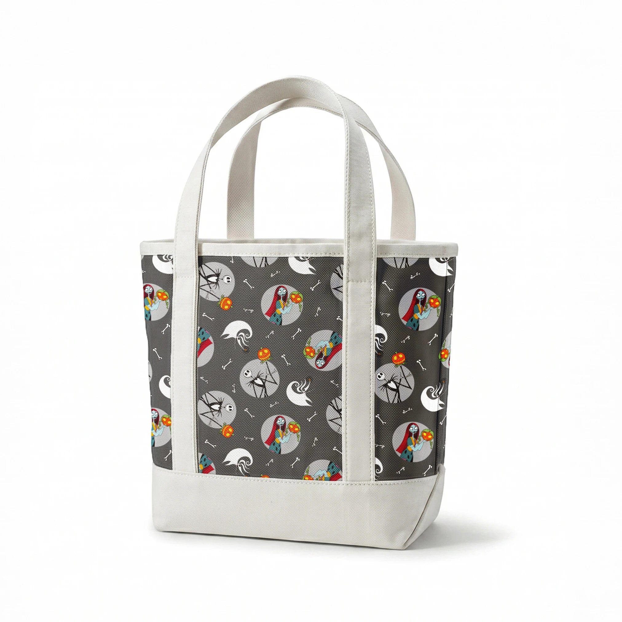 Nightmare Before Christmas themed pattern with Sally and Jack Skellington, pumpkins, bones, and ghostly designs on gray background springs canvastote mockup