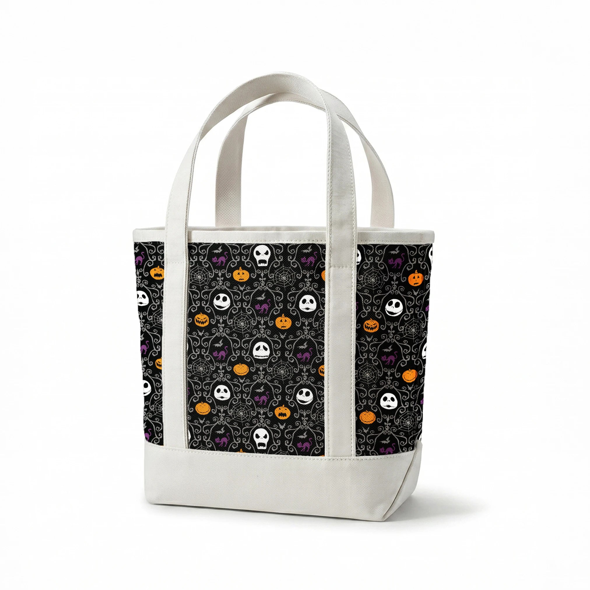 Nightmare Before Christmas pattern with skulls, pumpkins, bats and ornate swirls on black background springs canvastote mockup