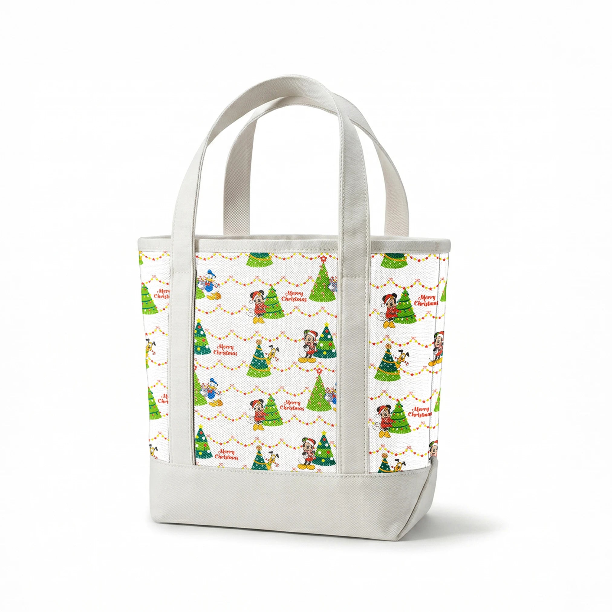 Disney Christmas pattern with Mickey, Minnie, and Donald beside decorated trees with star garland borders springs canvastote mockup