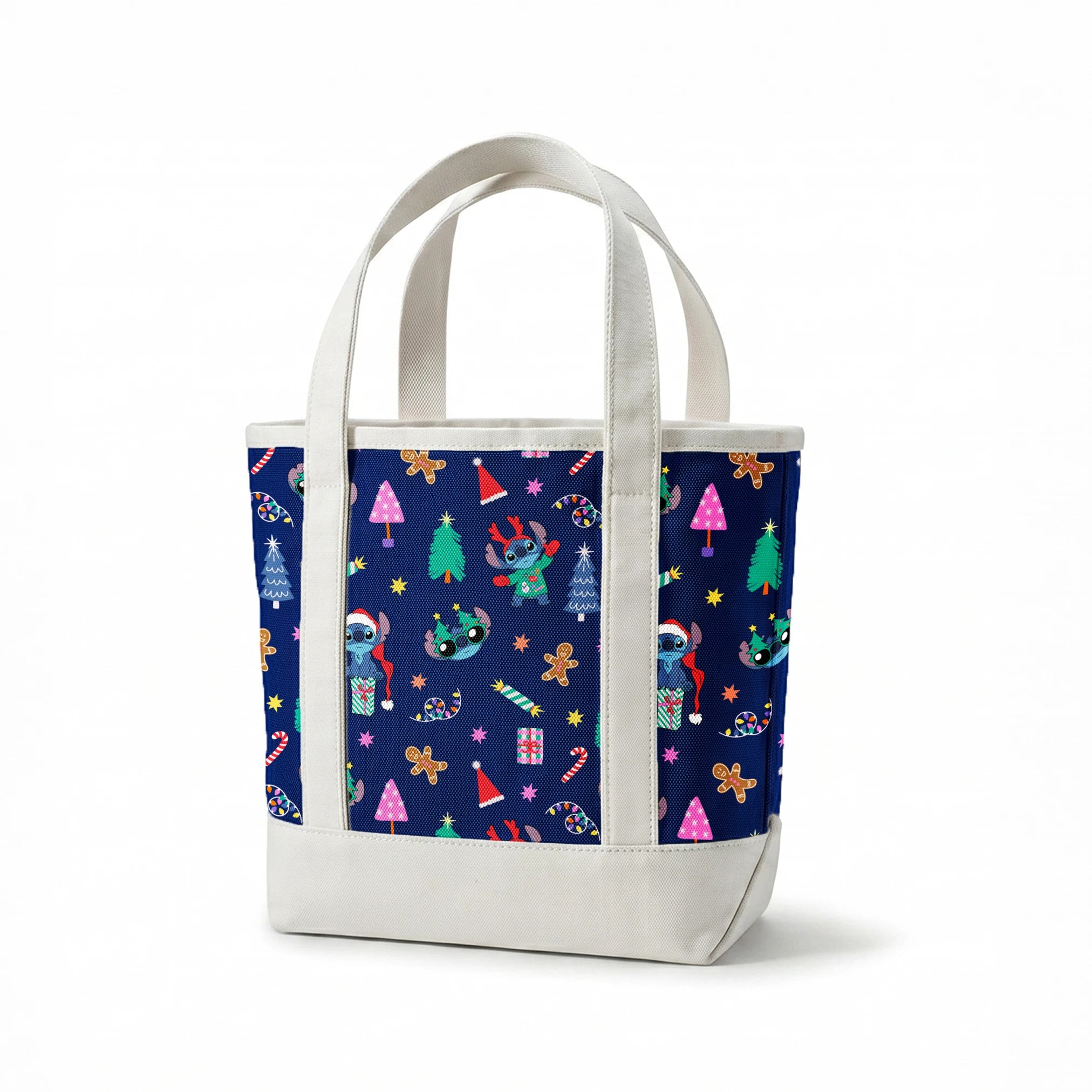 Festive Christmas pattern with Stitch, trees, candy canes, presents, and gingerbread men on navy background springs canvastote mockup