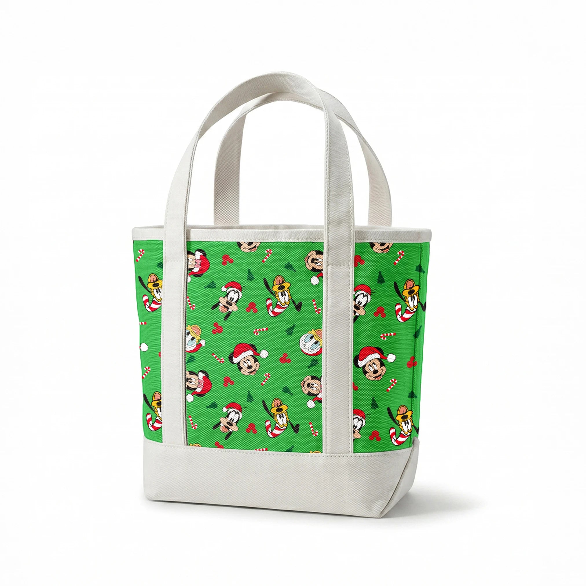 Disney Mickey Mouse characters in Santa hats on green background with candy canes and Christmas trees springs canvastote mockup