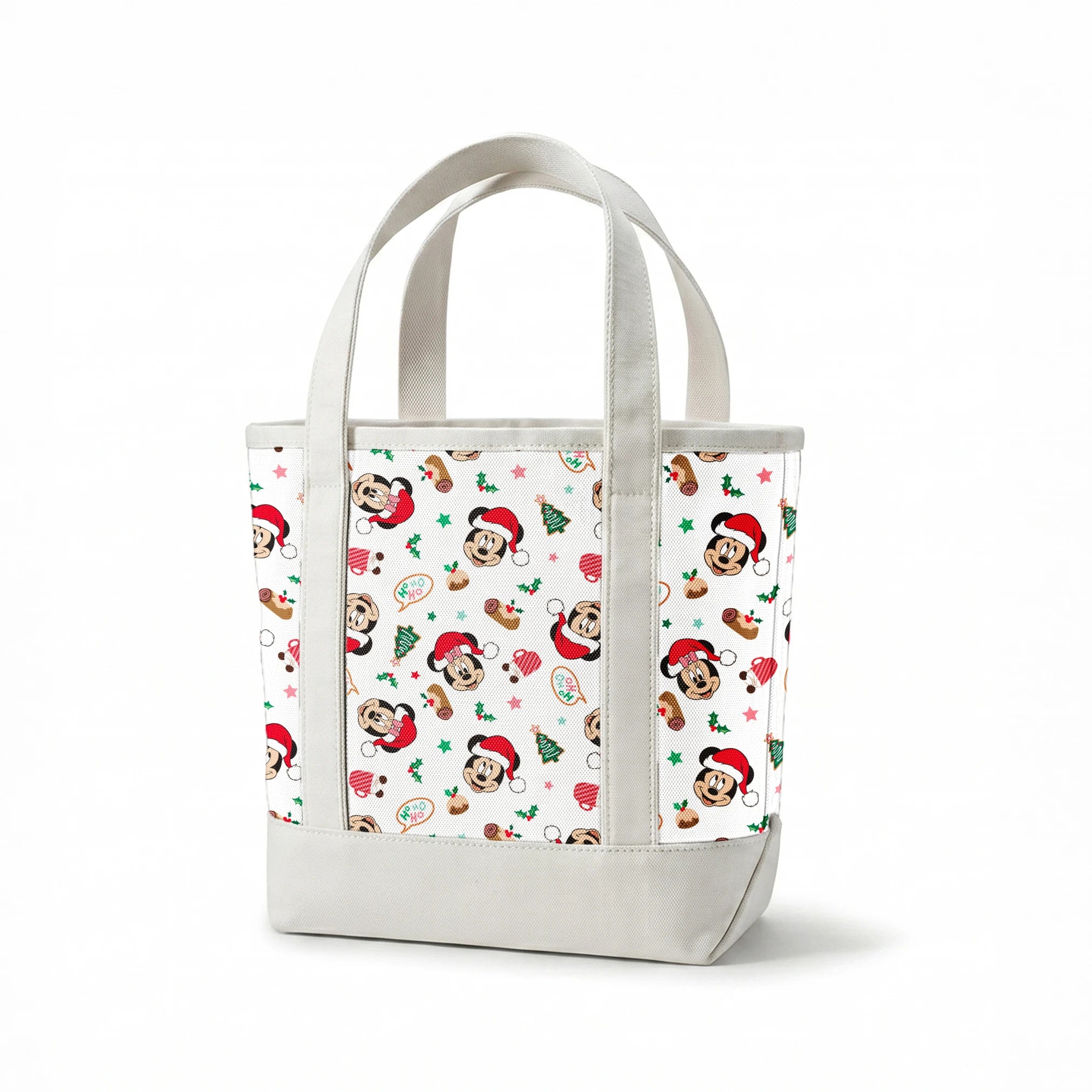 Mickey Mouse Christmas pattern with Santa hats, holly, speech bubbles, and festive decorations on white background springs canvastote mockup