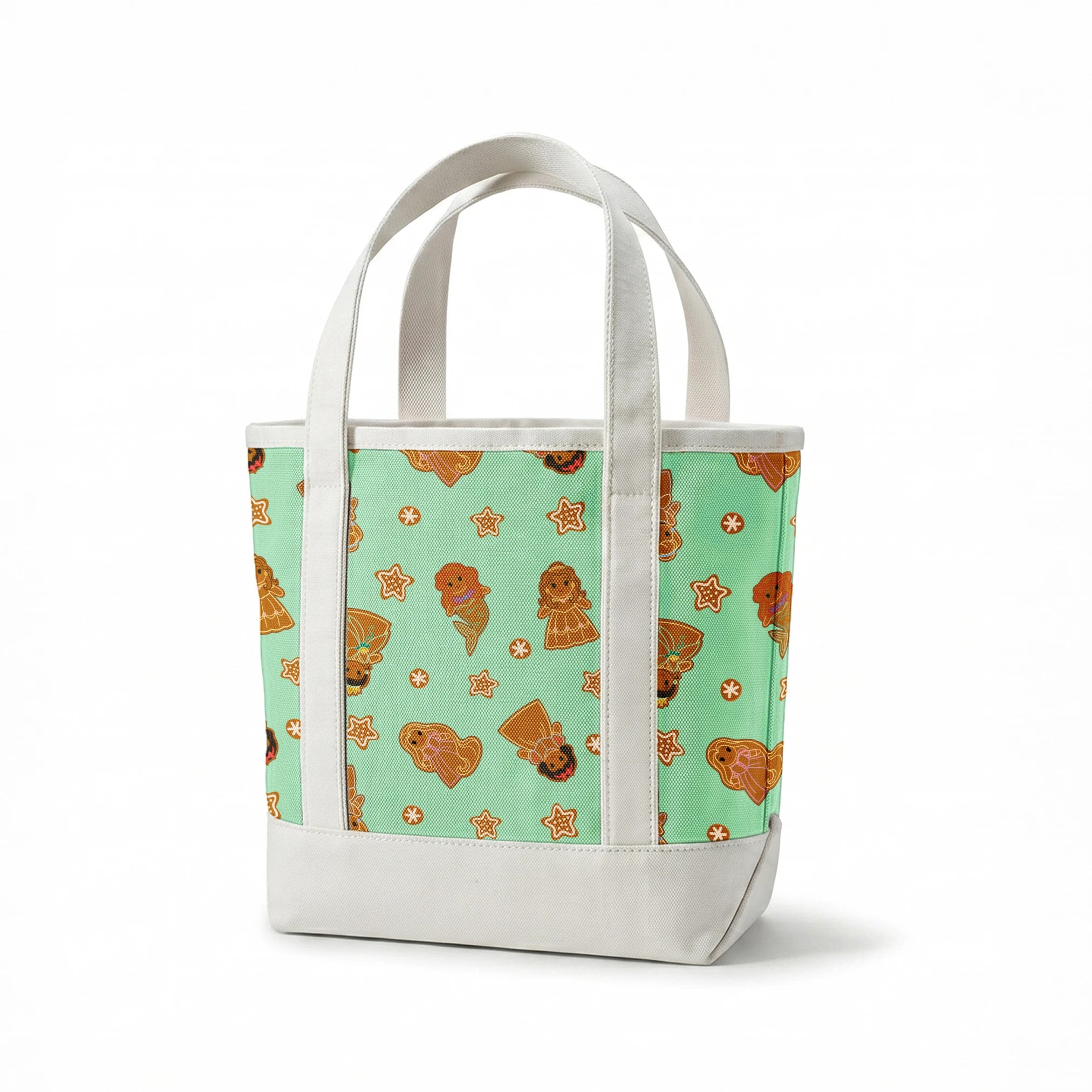 Disney Princess gingerbread cookies with star and snowflake designs on mint green background springs canvastote mockup