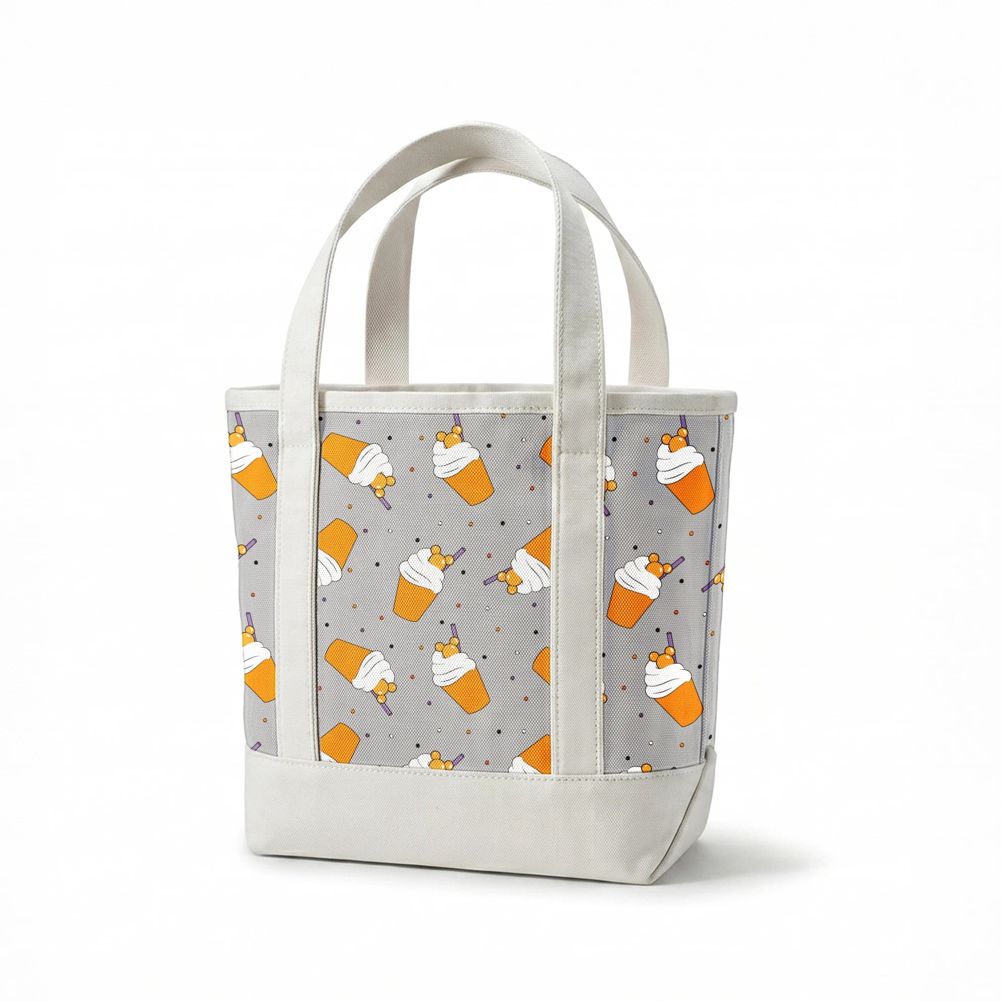Orange Disney-inspired drinks with whipped cream and purple straws on gray background with colorful dots springs canvastote mockup
