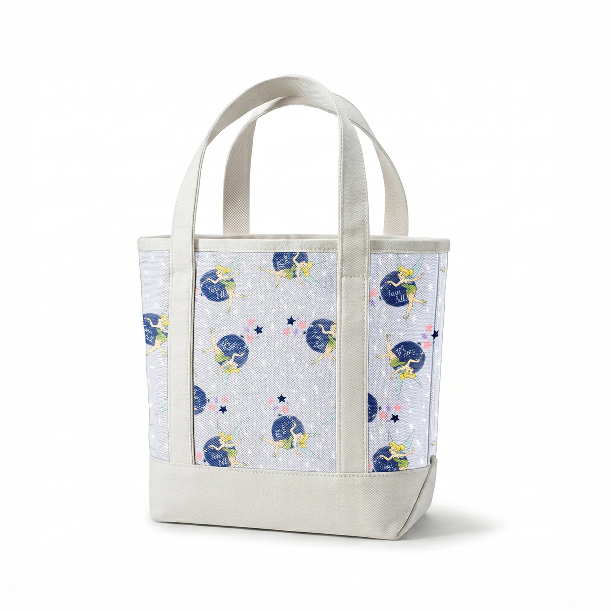 Tinker Bell pattern with the iconic fairy flying around blue moons and stars on a light gray background springs canvastote mockup