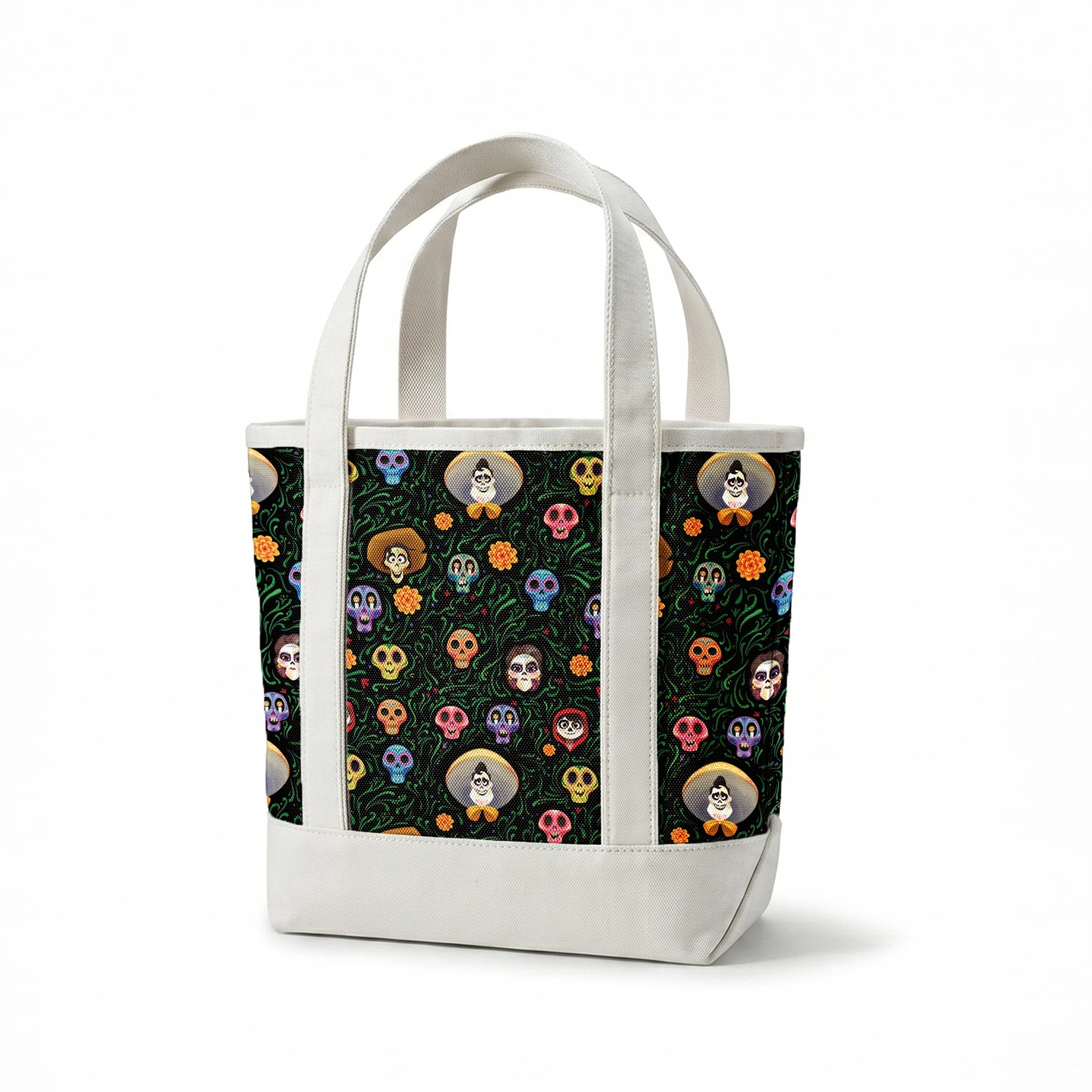 Colorful Coco stylized sugar skulls with sombreros scattered among green vines and orange flowers on black background springs canvastote mockup