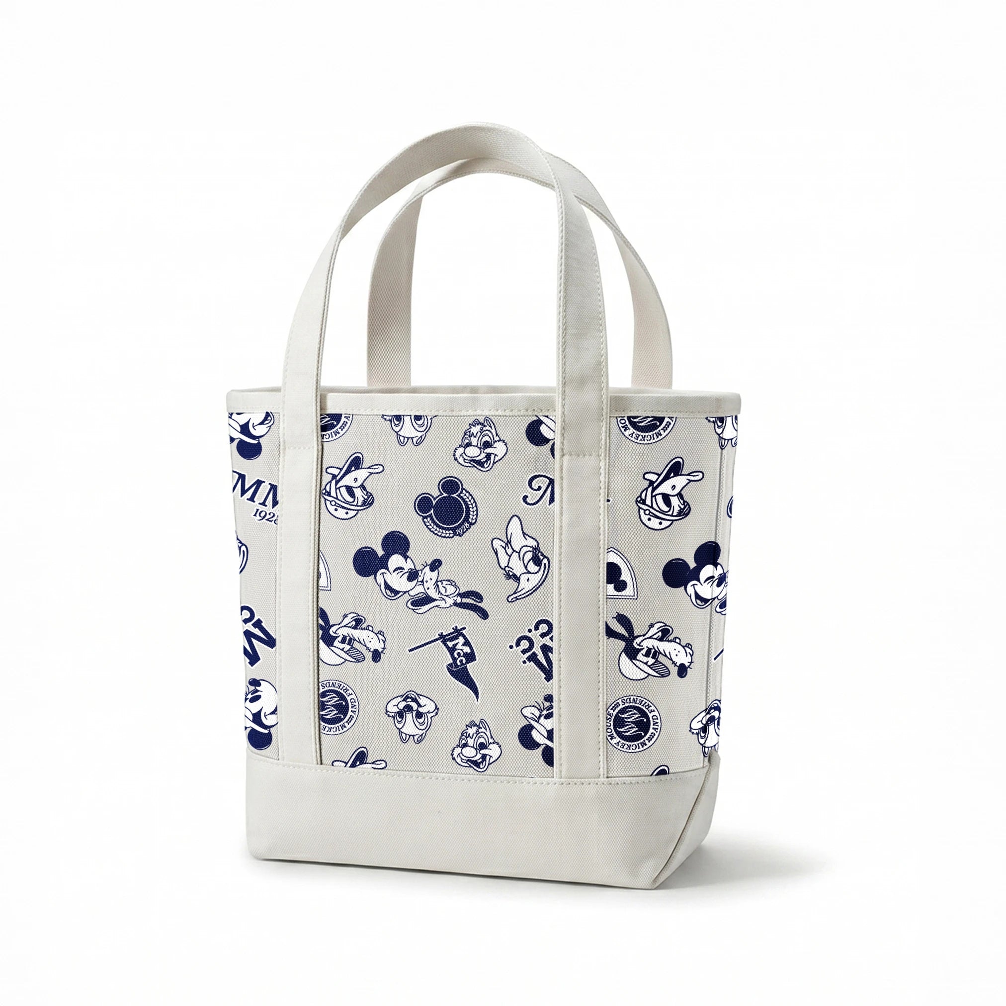 Disney character pattern with Mickey Mouse, Donald Duck and other classic cartoon figures in navy blue on light background. springs canvastote mockup