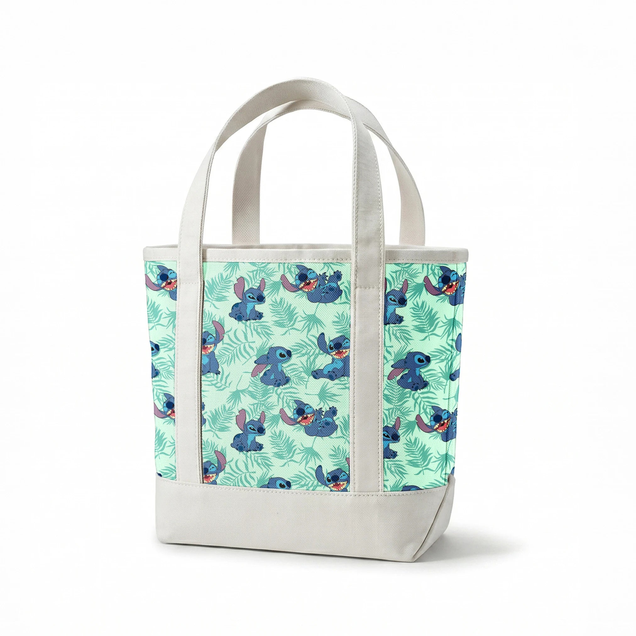 Blue cartoon alien character Stitch in various playful poses against mint green tropical leaf pattern background springs canvastote mockup