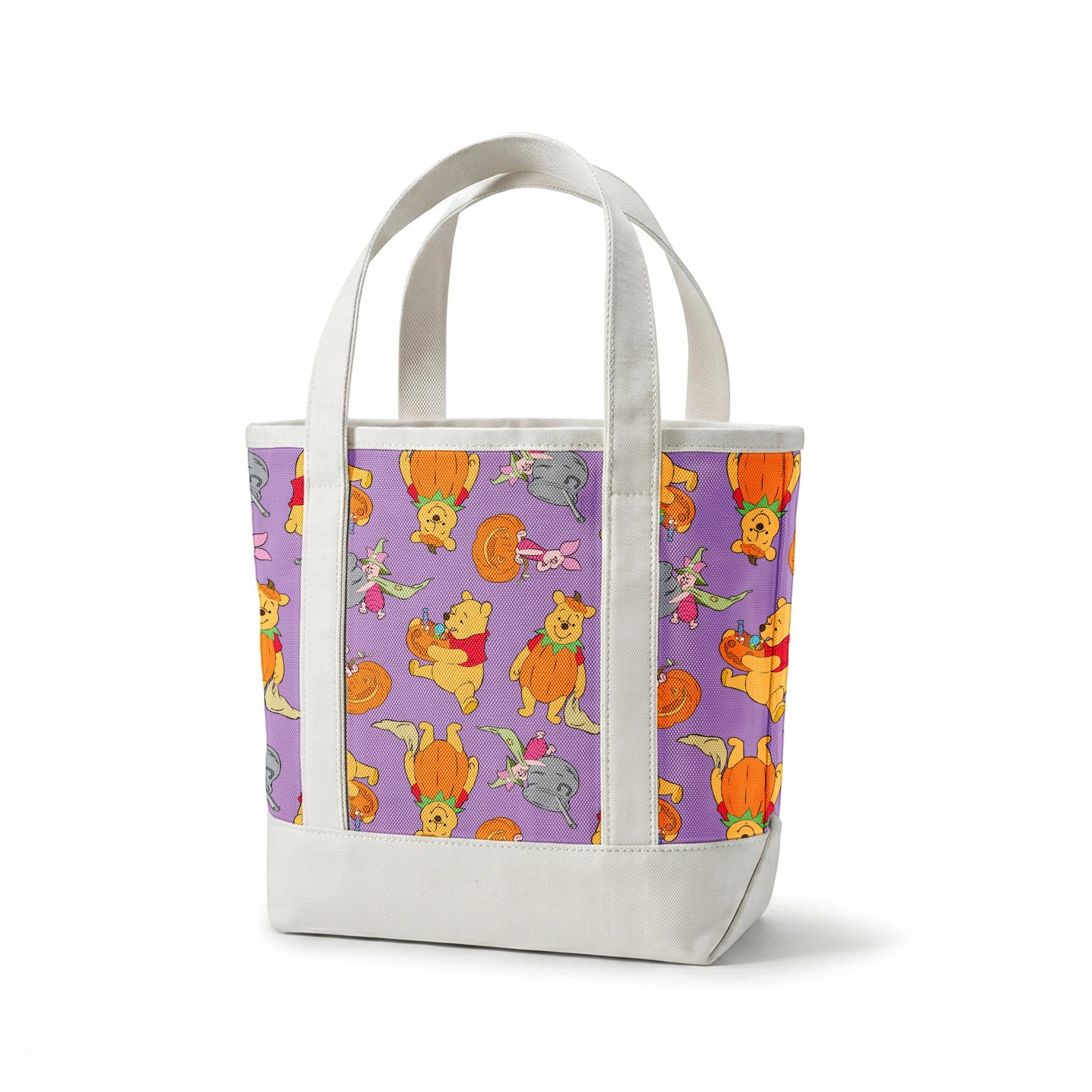 Whimsical Winnie the Pooh pattern with Piglet and Eeyore on purple background with pumpkins springs canvastote mockup