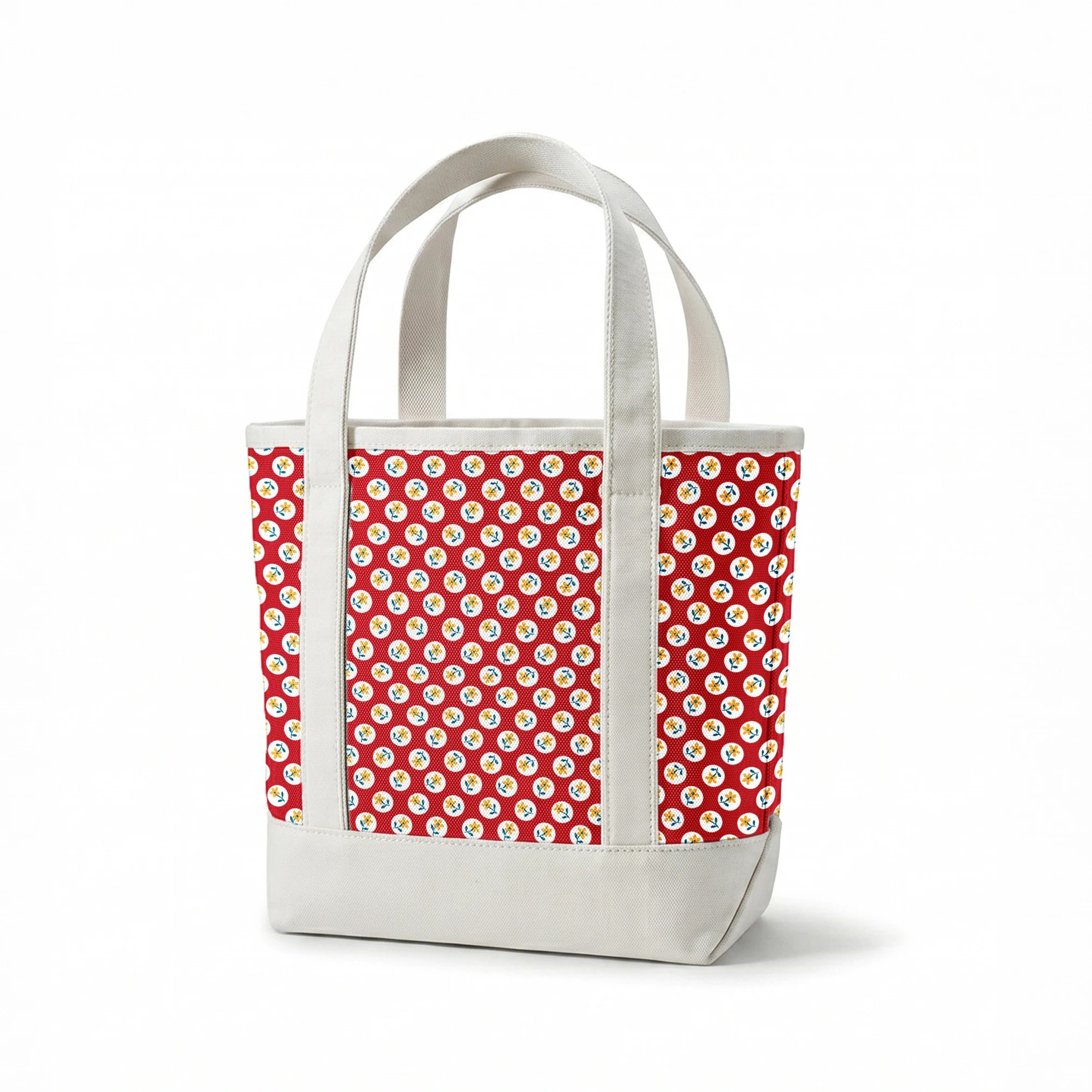 Yellow flowers with blue stems on white circles against red background in repeating pattern springs canvastote mockup
