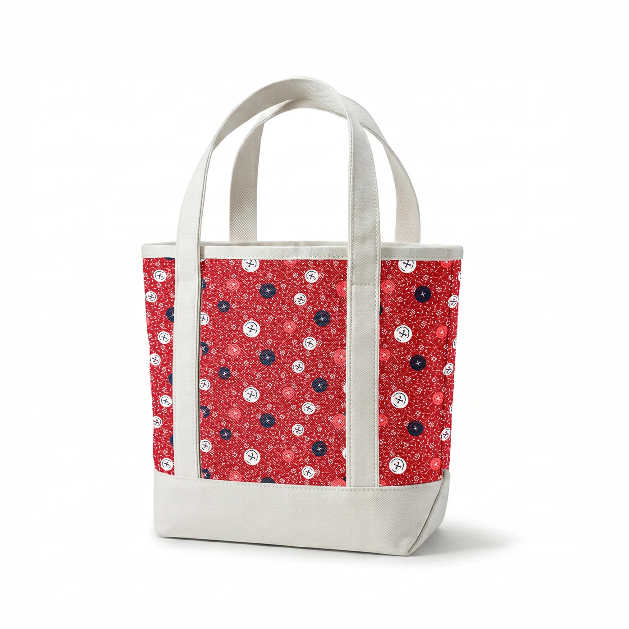 Red background with scattered buttons in white, blue, and coral colors featuring sewing motifs and small floral patterns springs canvastote mockup