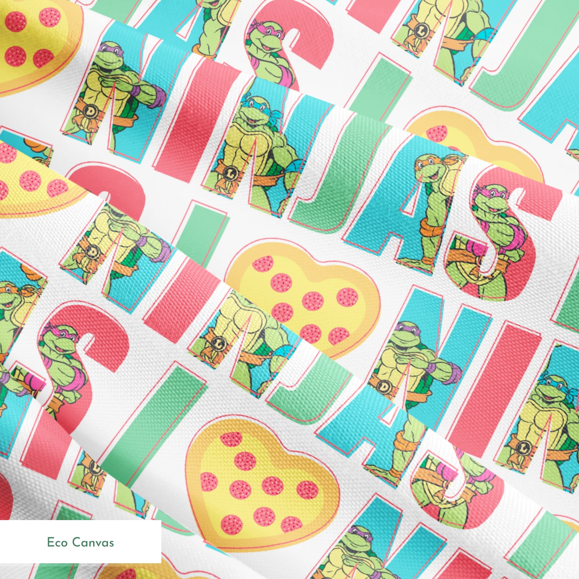 Teenage Mutant Ninja Turtles design with “I heart Ninjas” text with a pizza heart graphic, and Michelangelo and Leonardo in pastel colors. springs ecocanvas texture